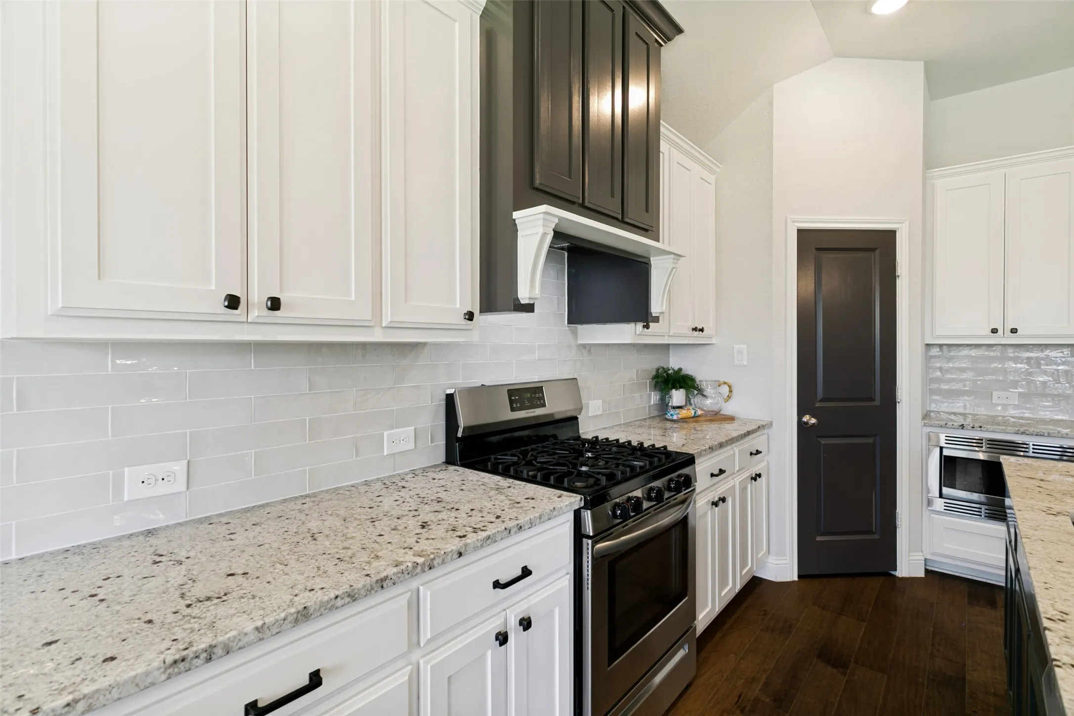 Gas range, tons of counter space and a pantry.