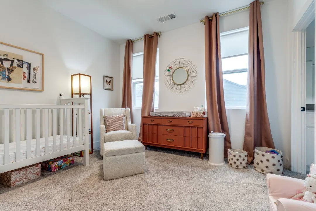 3rd floor bedroom with ensuite bathroom and walk-in closet.