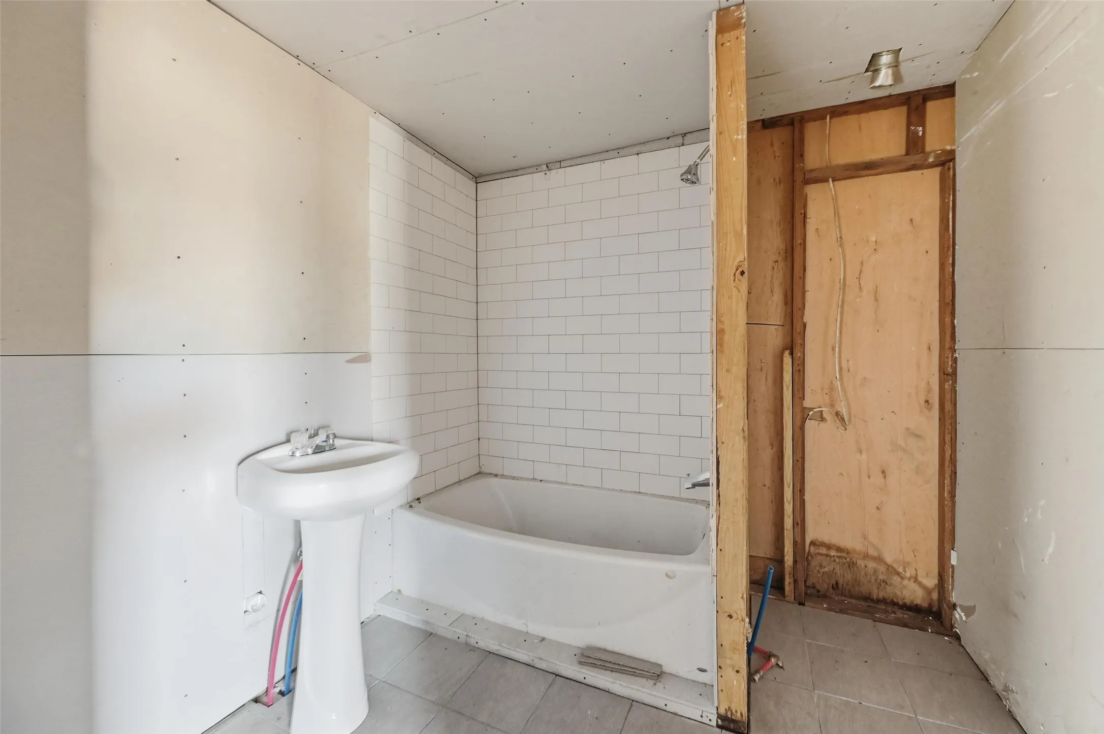 Bathroom featuring shower / bath combination