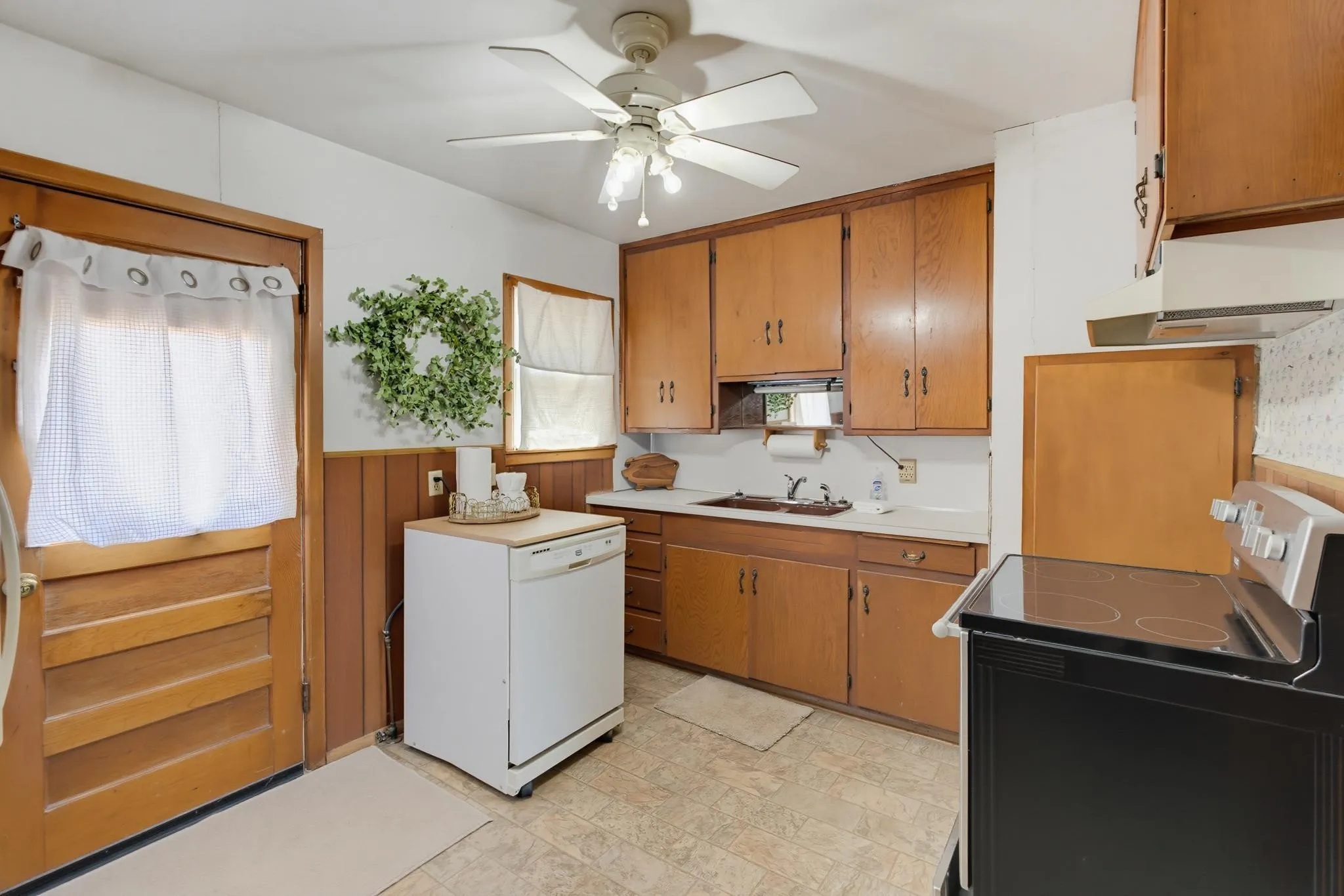Kitchen with exit to back yard.