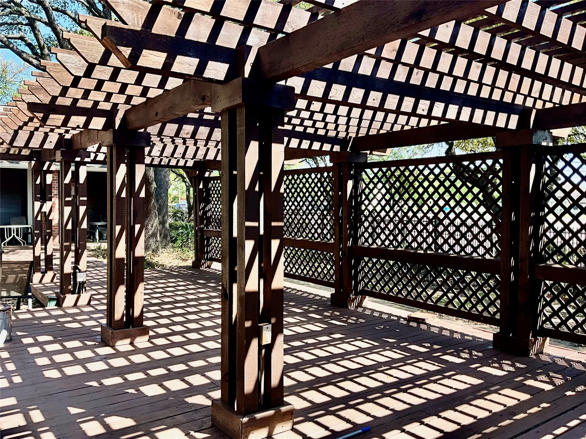 Deck featuring a pergola