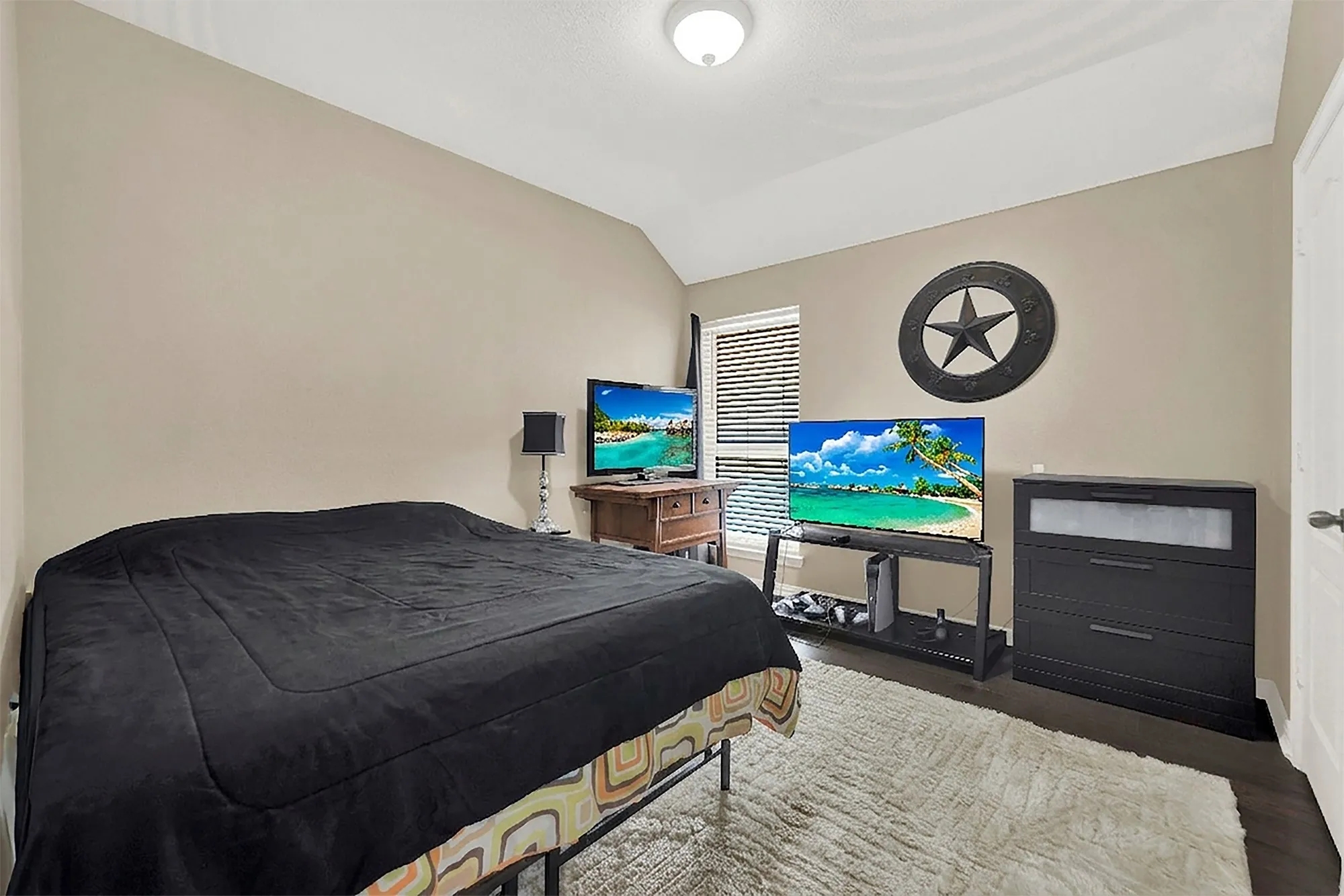 Vaulted ceiling and neutral wall tones