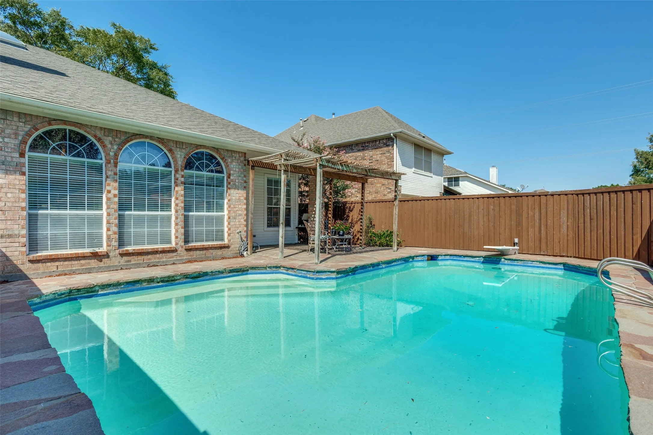 pool and covered patio