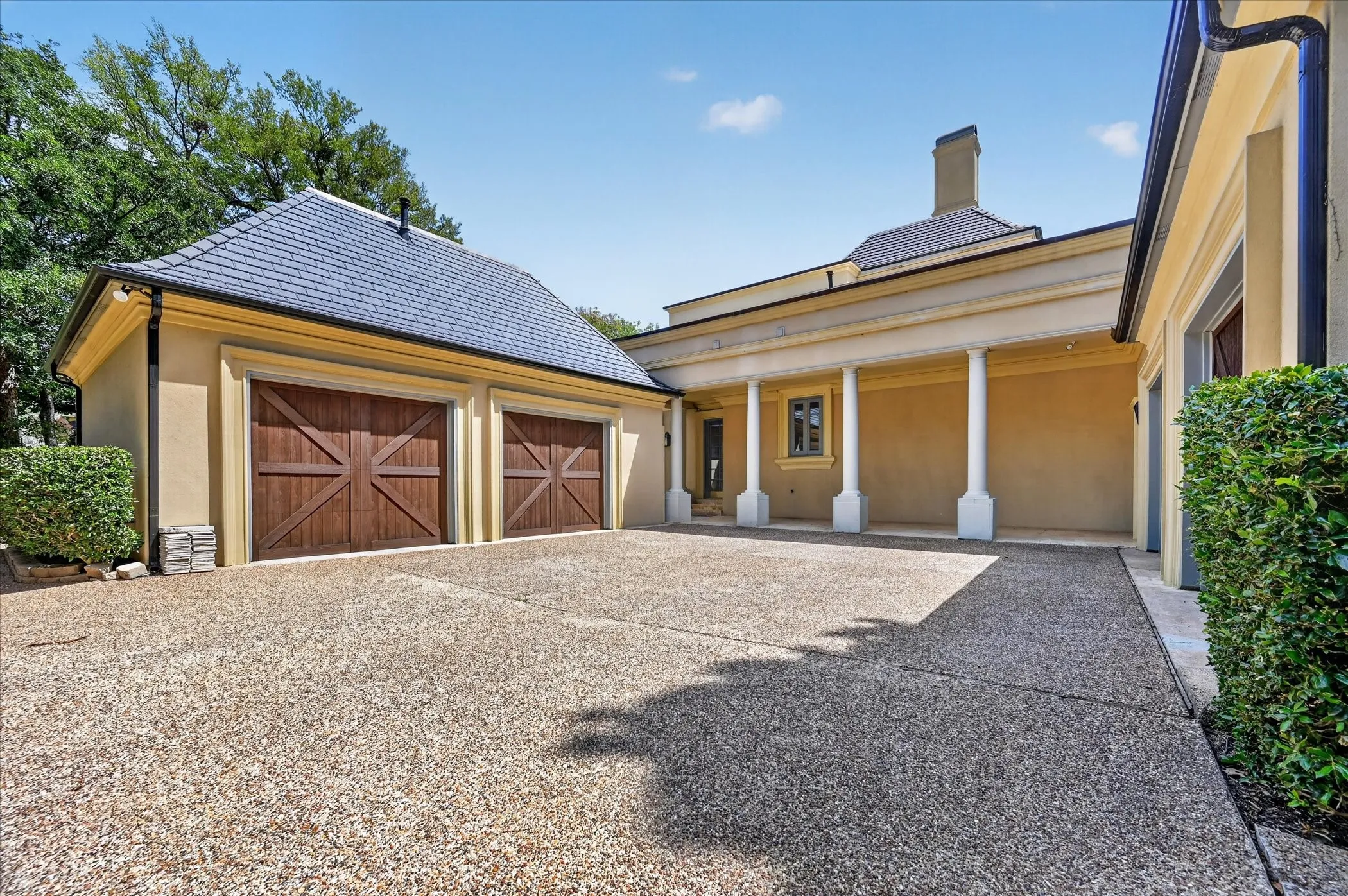 An oversized 4.5-car garage and recently installed high-end slate roof complete this extraordinary estate