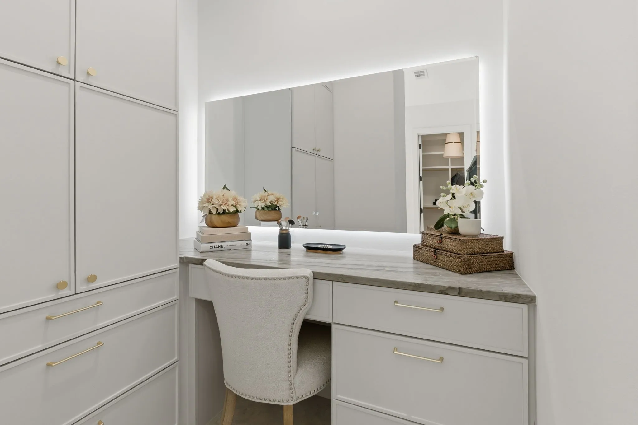 Private make-up area with lighted mirror