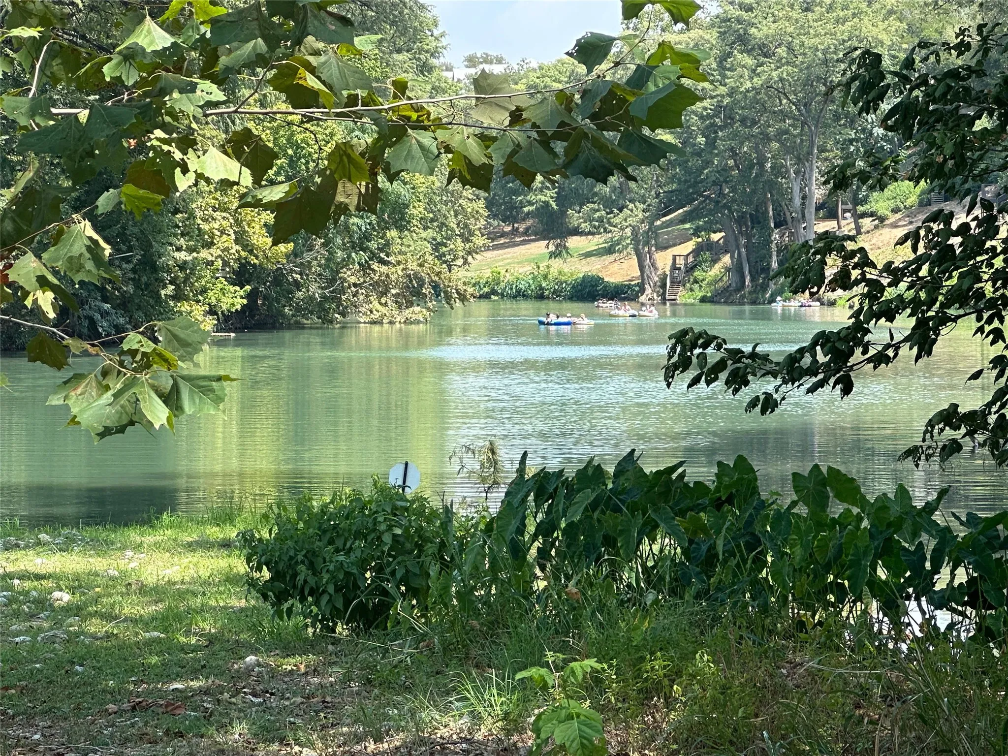 Waterfront property with verdant surroundings