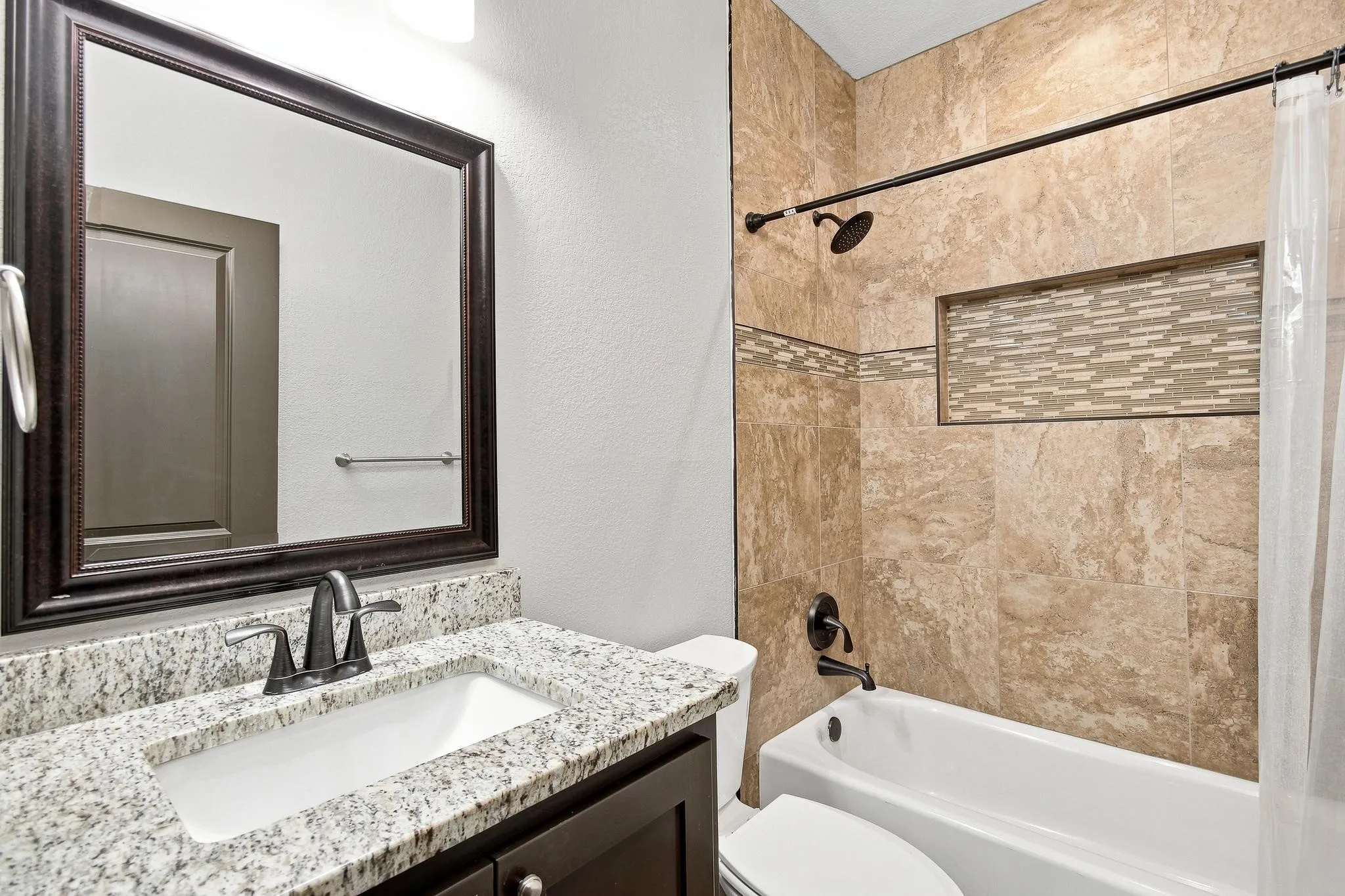 This bathroom is located within the guest front bedroom.