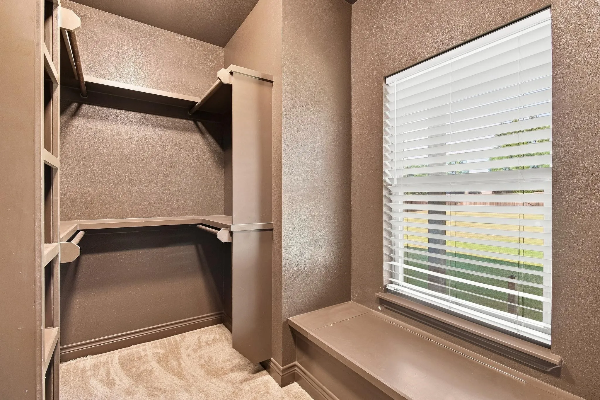 Primary large walk in closet.