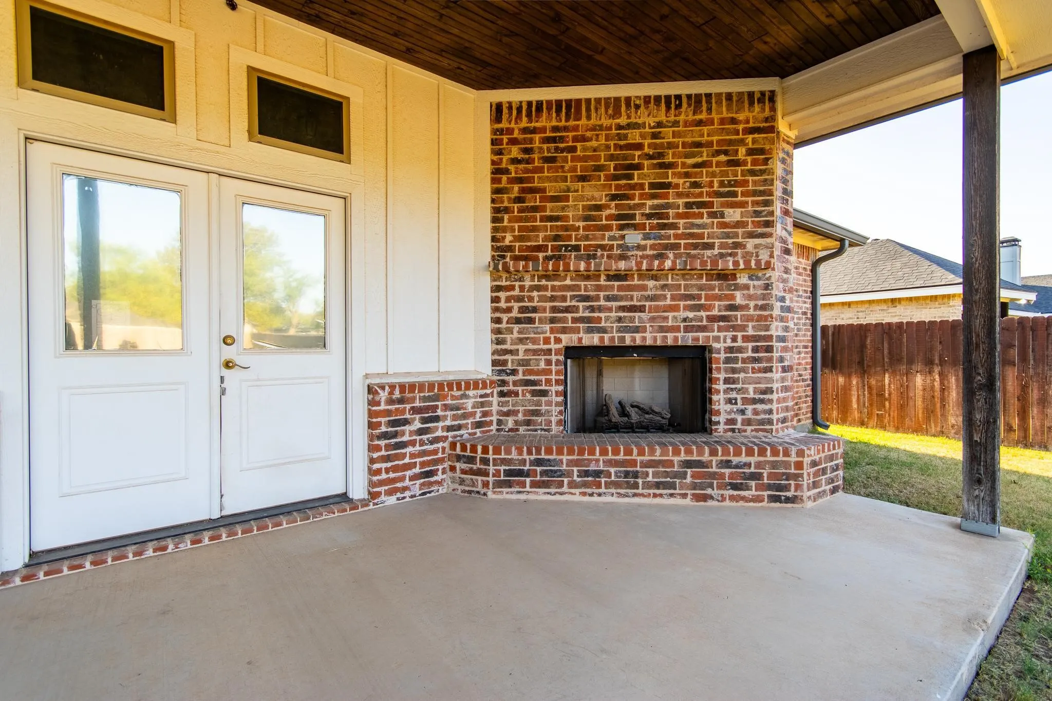 Cozy outdoor fireplace for those cooler evenings.