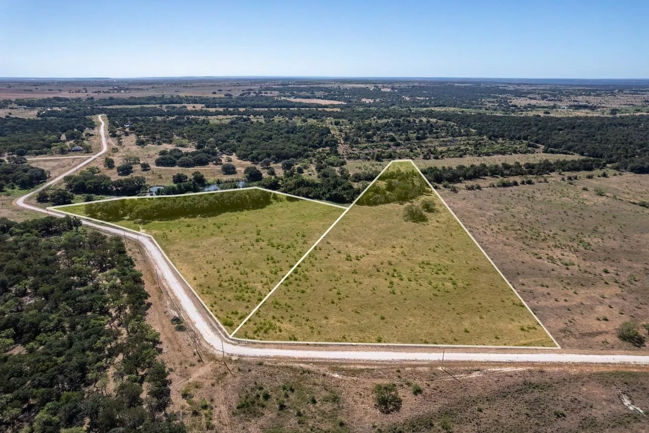 Owner is selling the contiguous lot as well. Lots can be sold together.