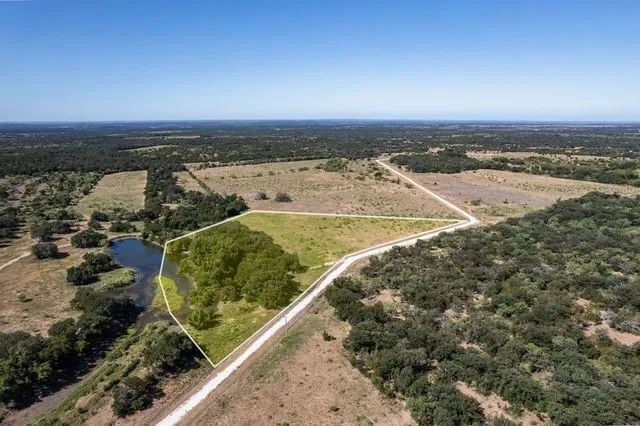 Perfect combination of land, matures trees and pond
