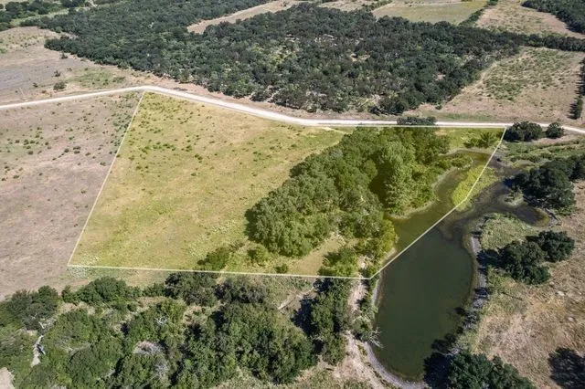 Incredible and unique lot with pond and sand island