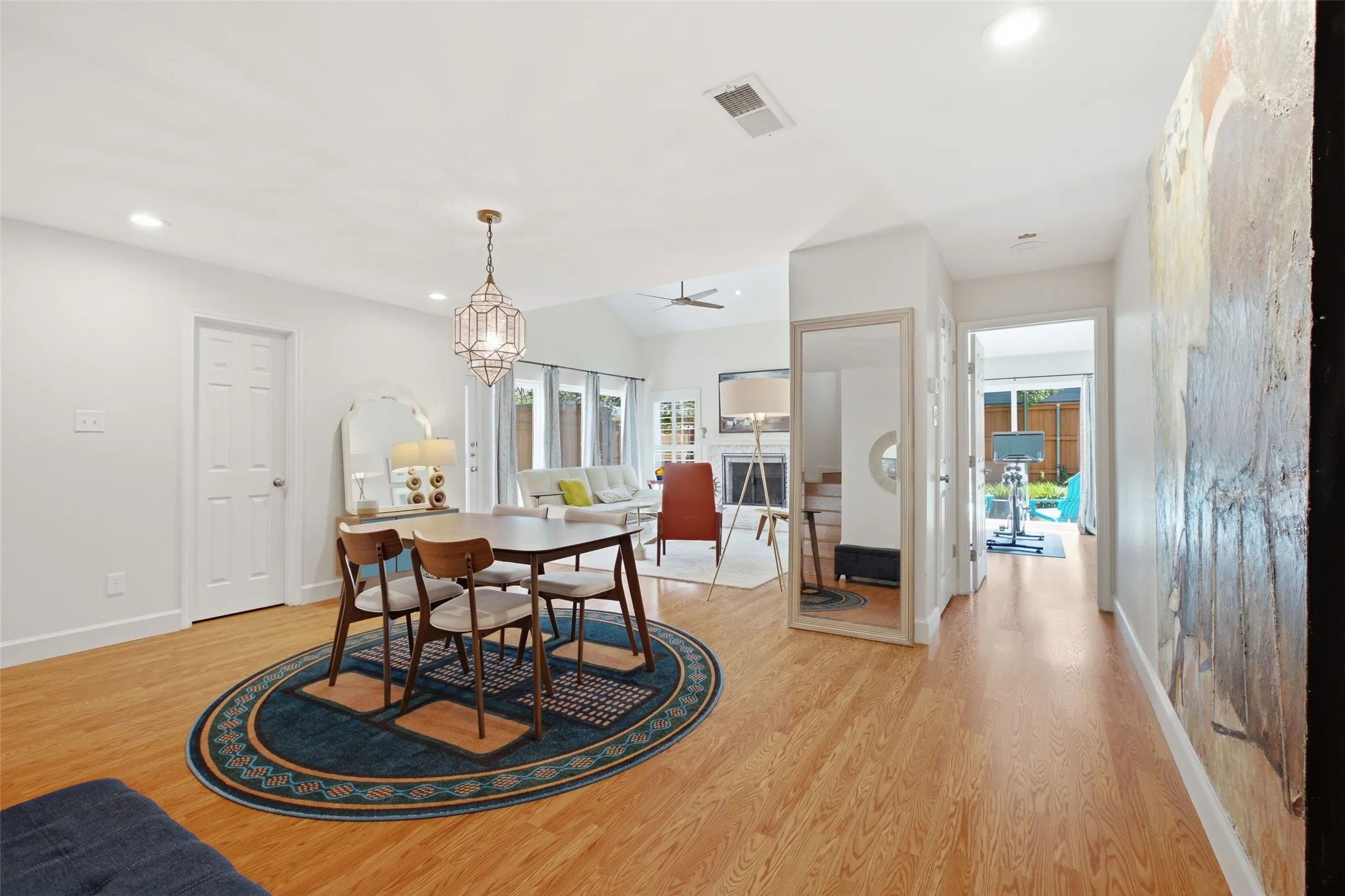 The main living spaces connect naturally from room to room, with a clear sightline all the way through to the backyard. The layout lives larger than the square footage suggests.