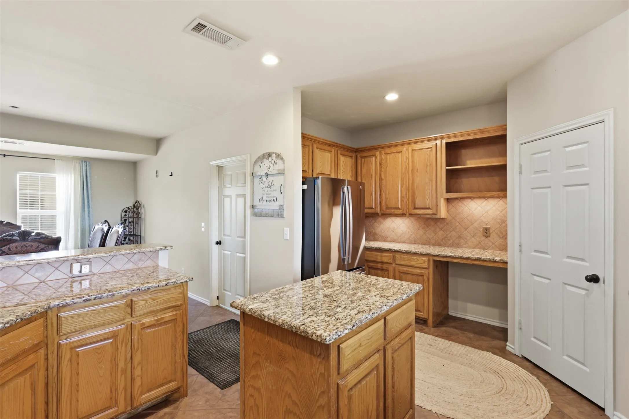 Built-In features include desk and shelves for organizing recipe books.