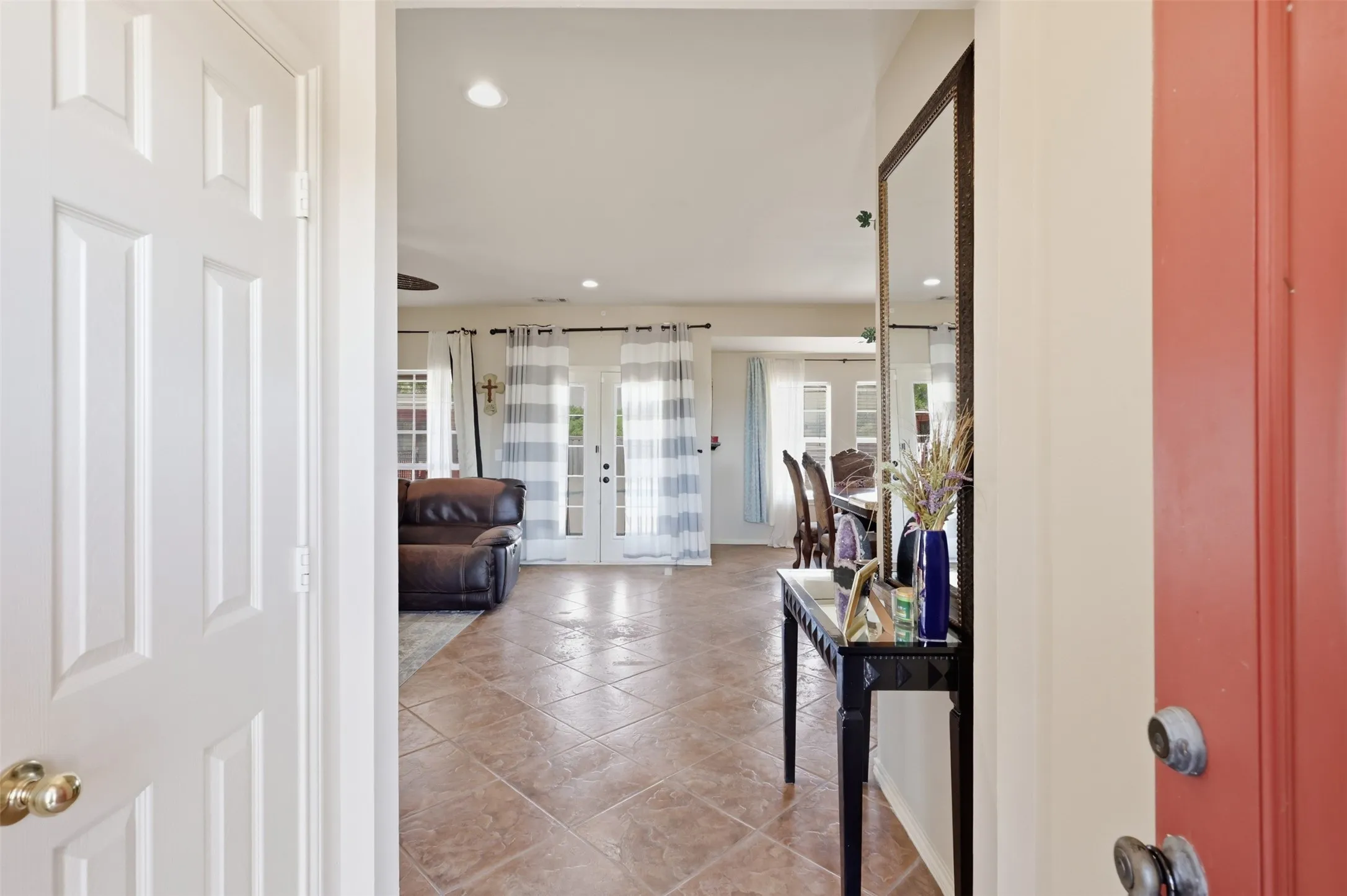 Open the door to entry and open concept living.