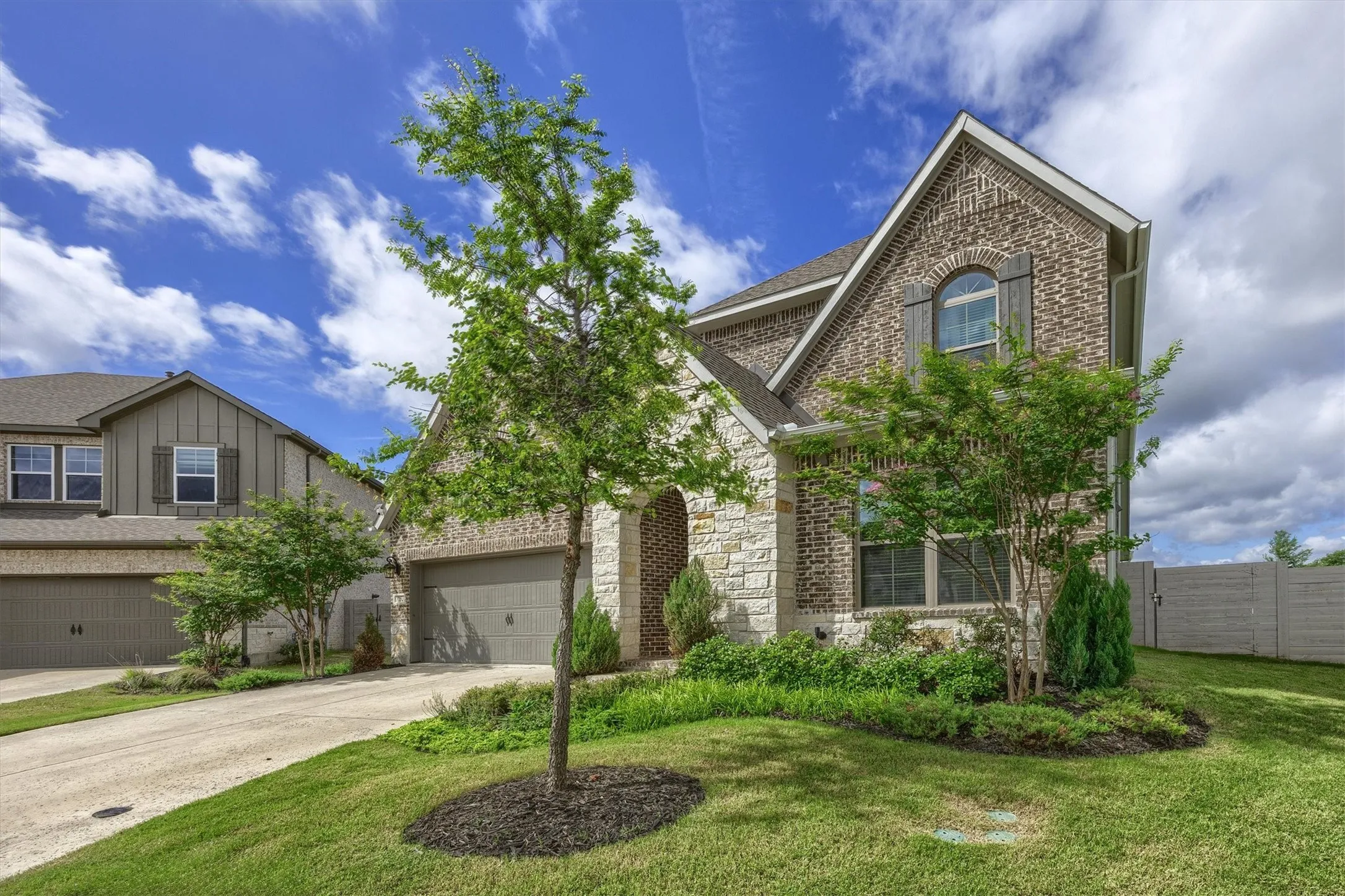Lovely landscaping with excellent driveup appeal!