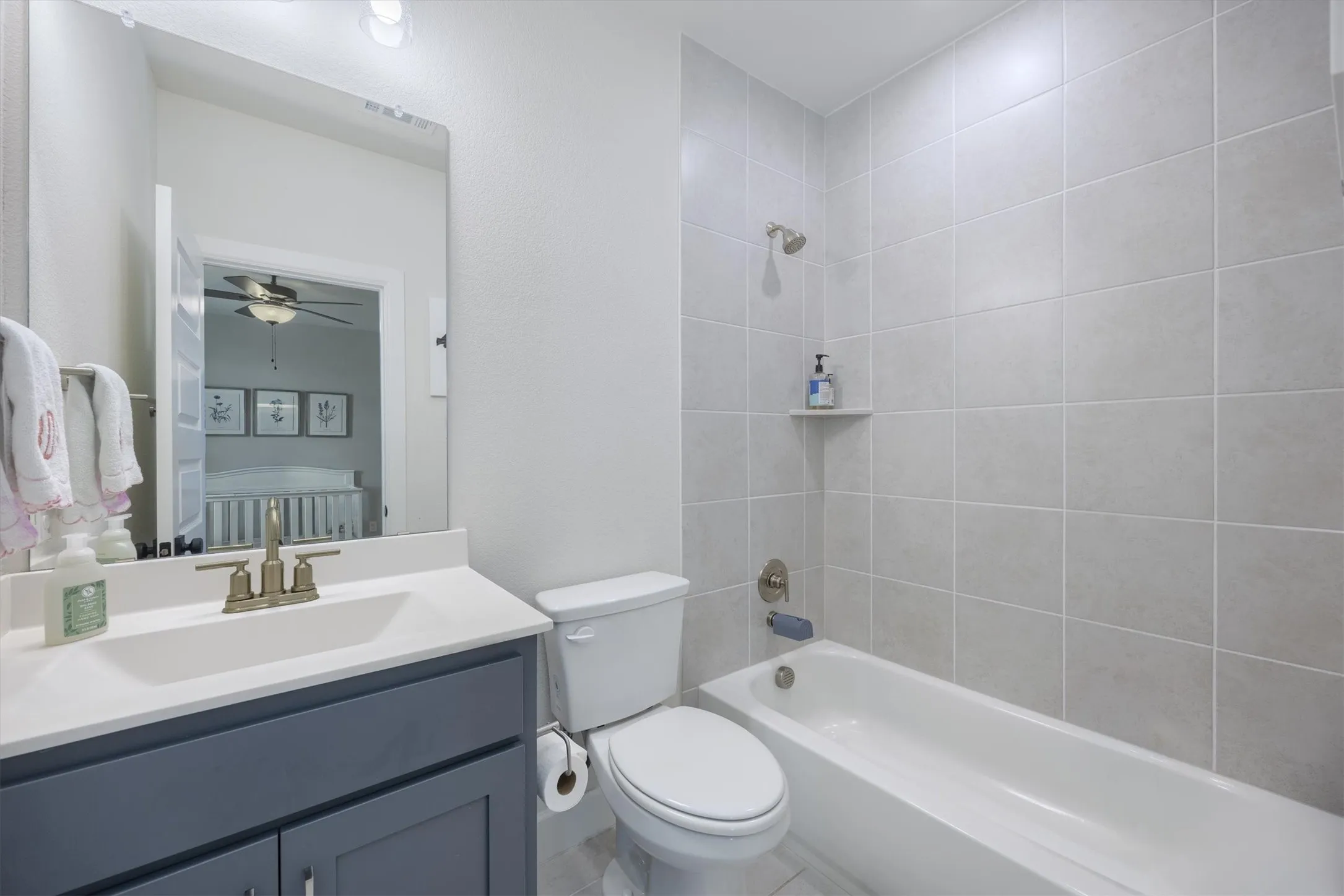 3rd bath located with the 4th bedroom
