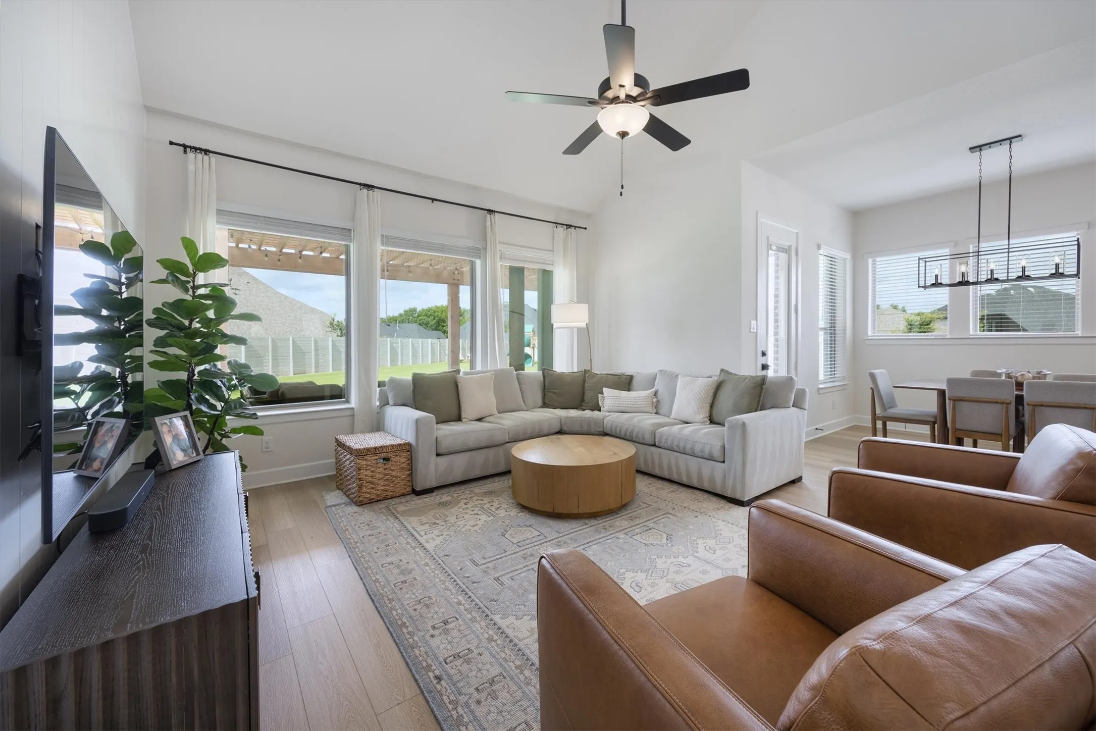 The spacious family room also faces the spacious backyard.