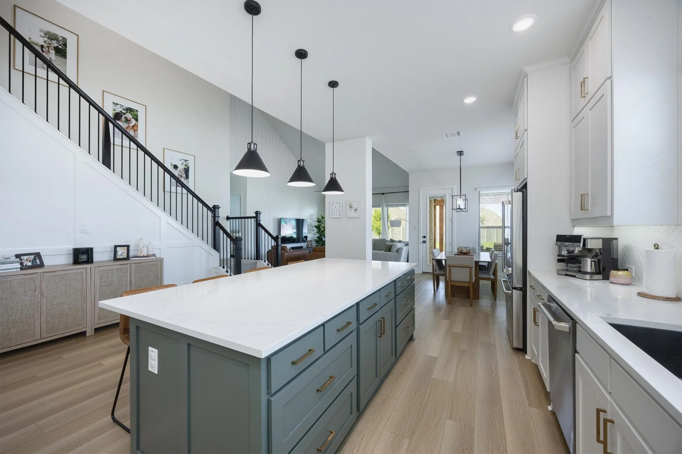 The stunning kitchen is open to the family room.