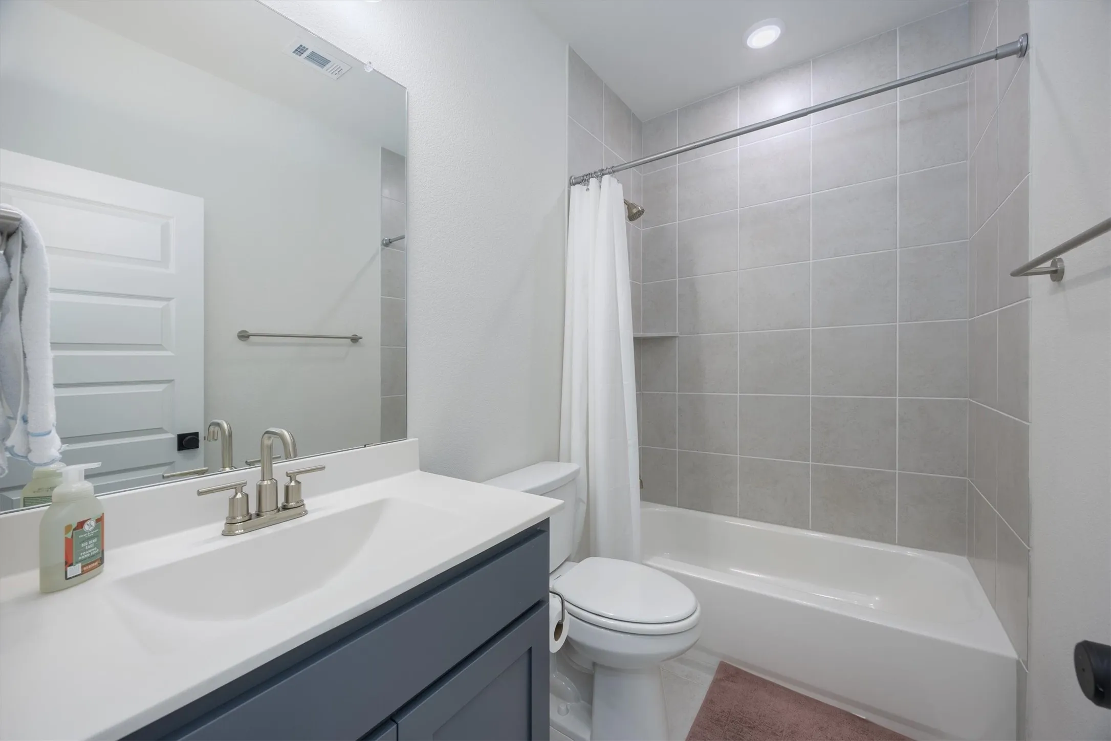 2nd hall bath located with the third bedroom