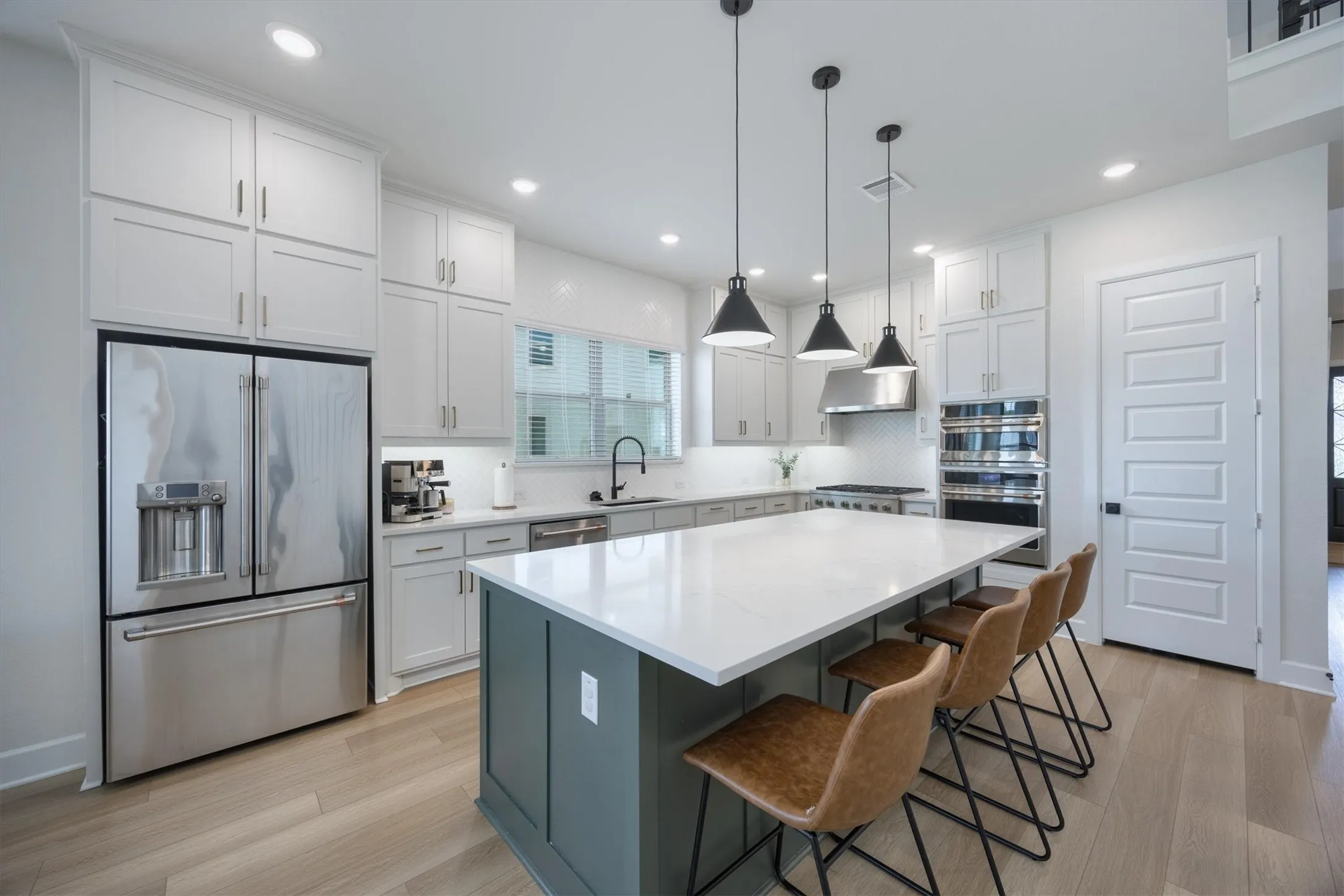 Check out the appliances! Cafe' appliances adorn this kitchen for state of the art gourmet cooking!