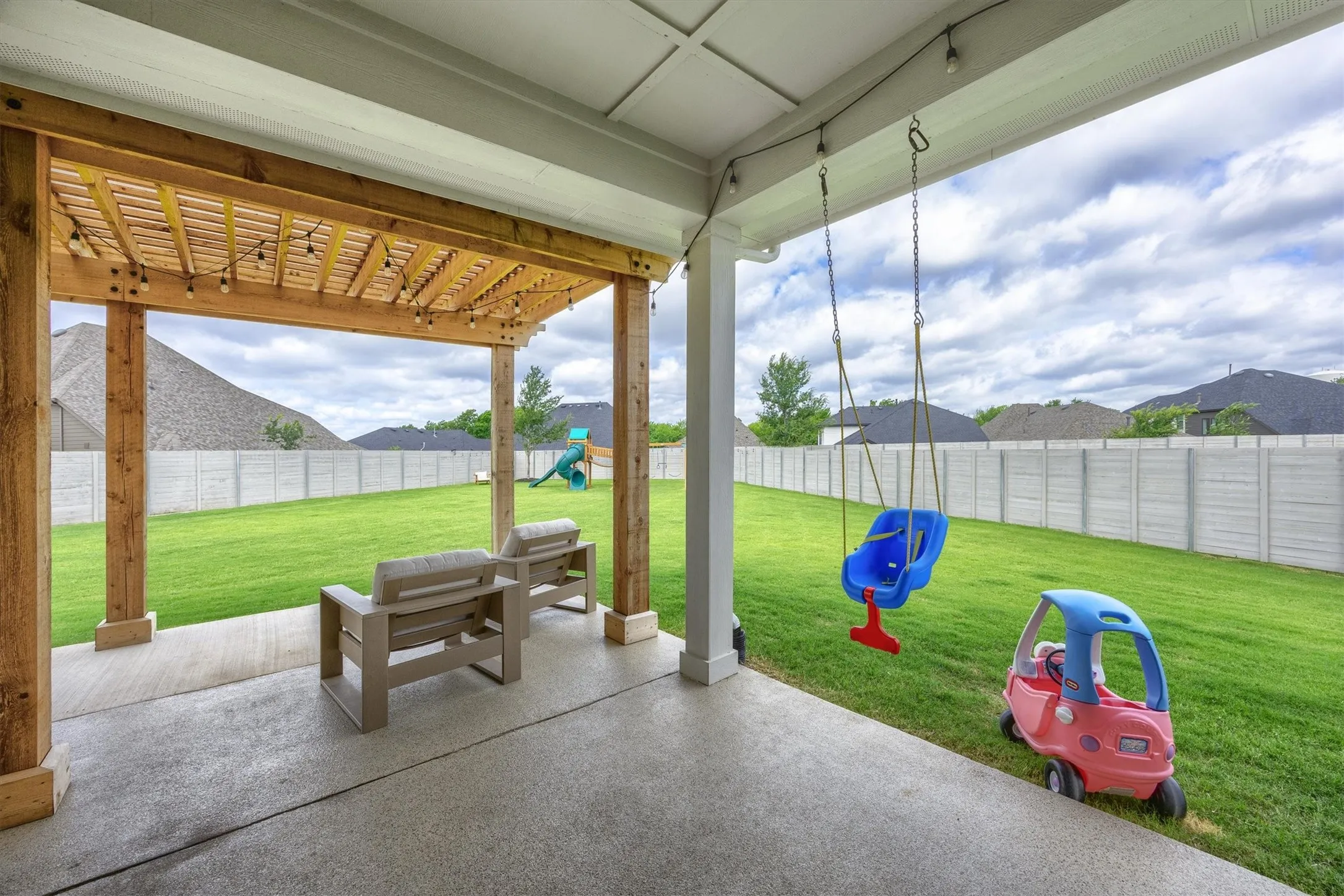 Extended covered patio with pergala addition.