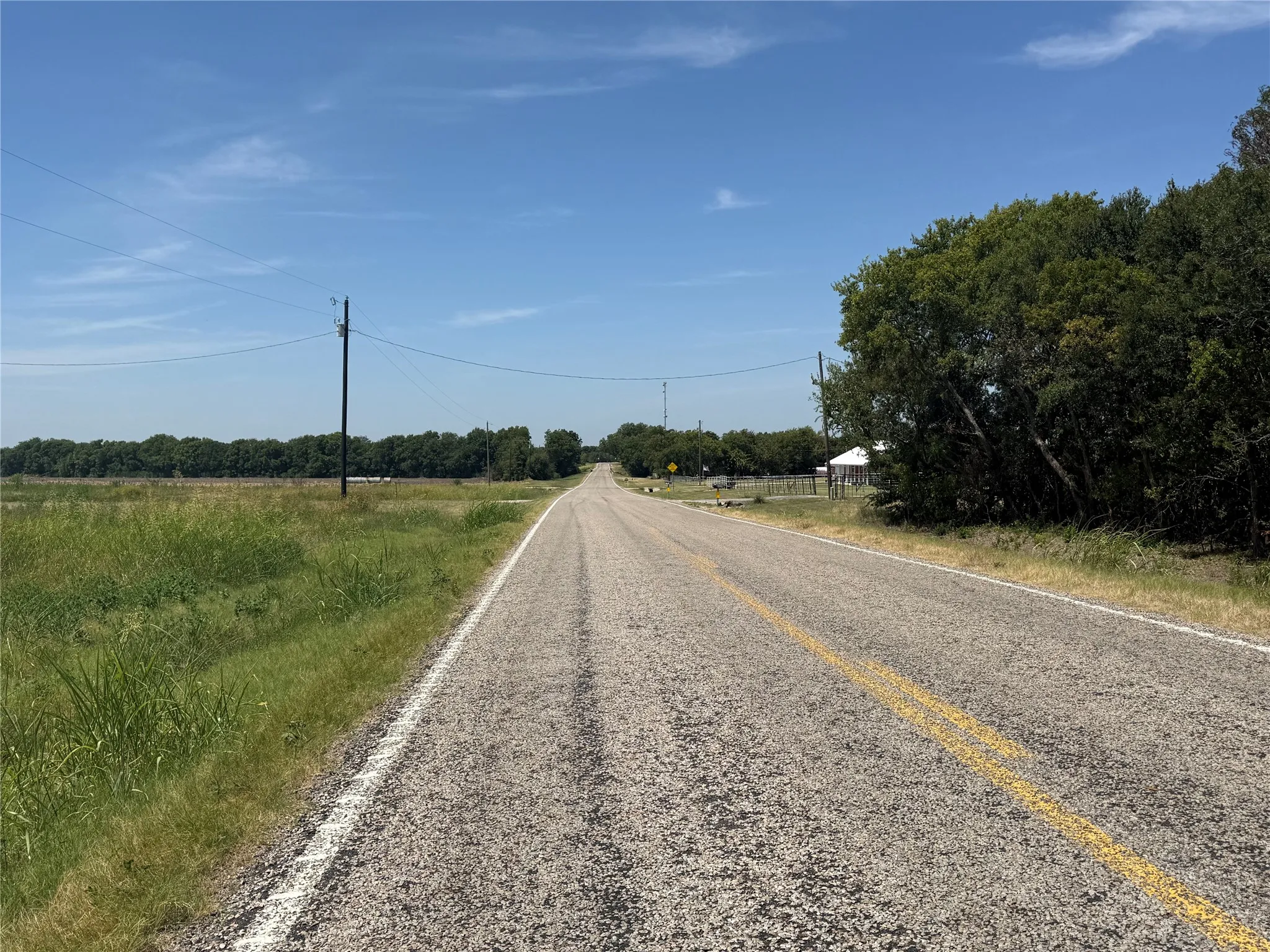 Looking West FM 272 - Communication Cell Tower down the road on the Northwest side of the road