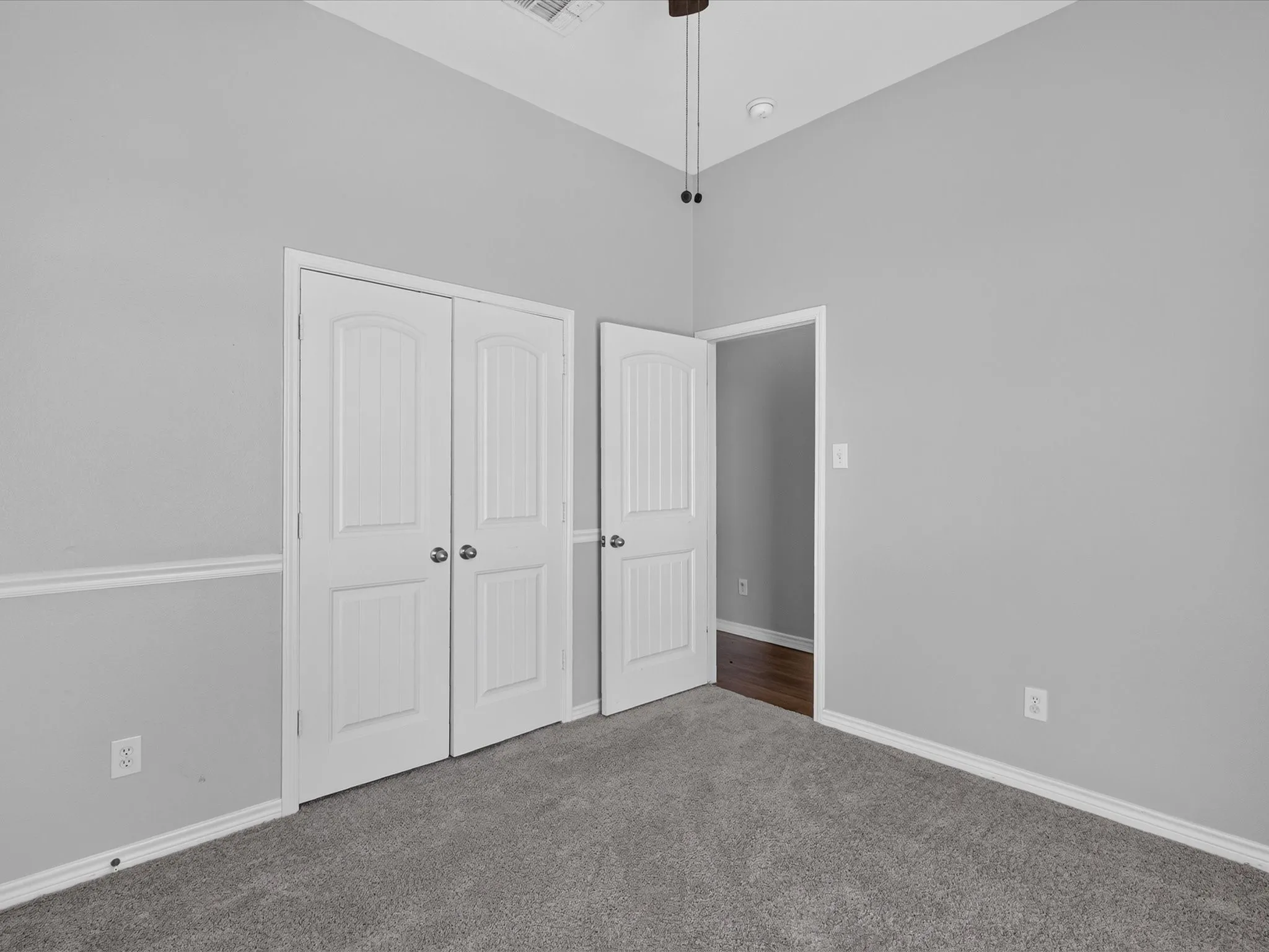 Vaulted ceiling with a flush-mount light fixture