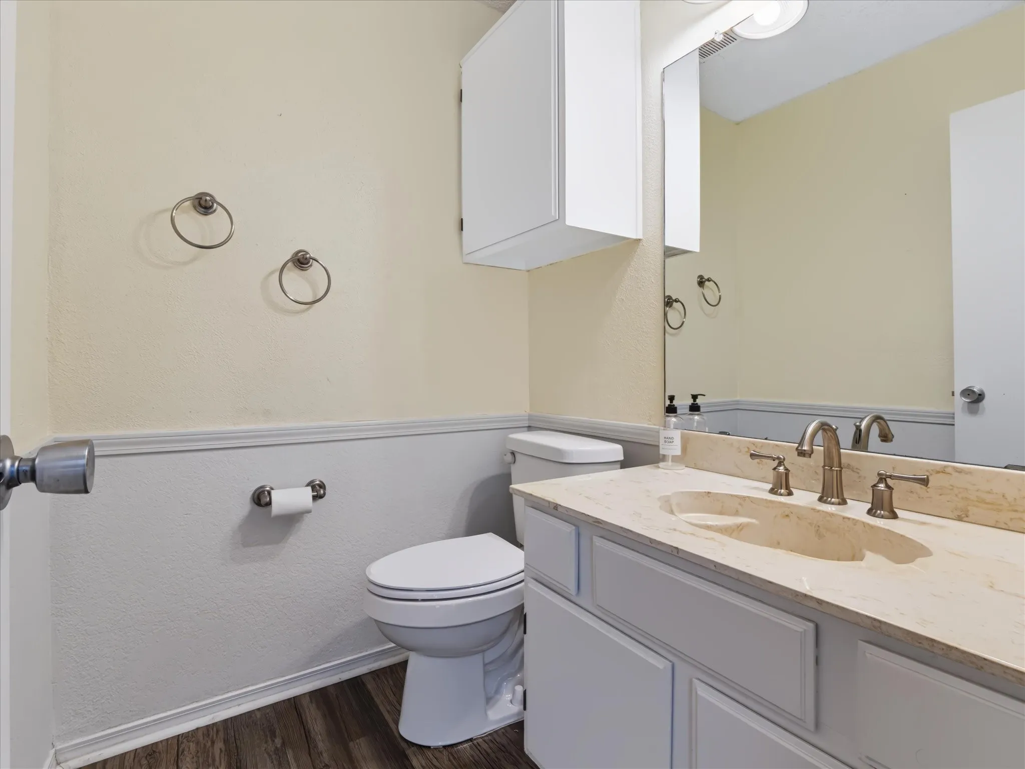 1st floor half bath with adorable decorative chair rail molding