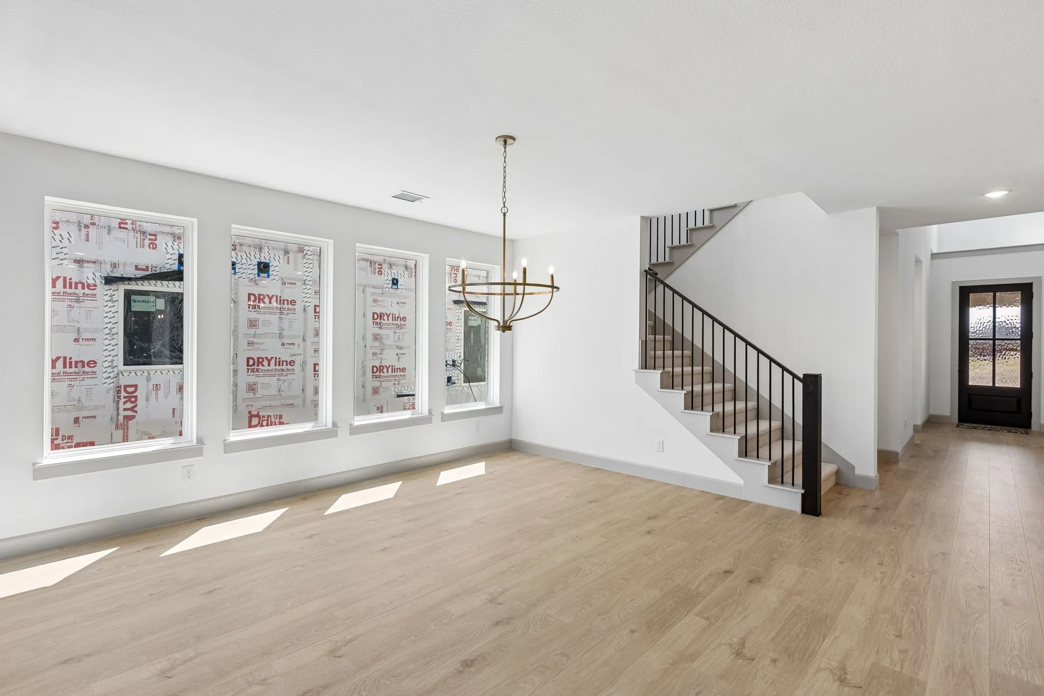 Windows everywhere stream in tons of natural light into this dream home!