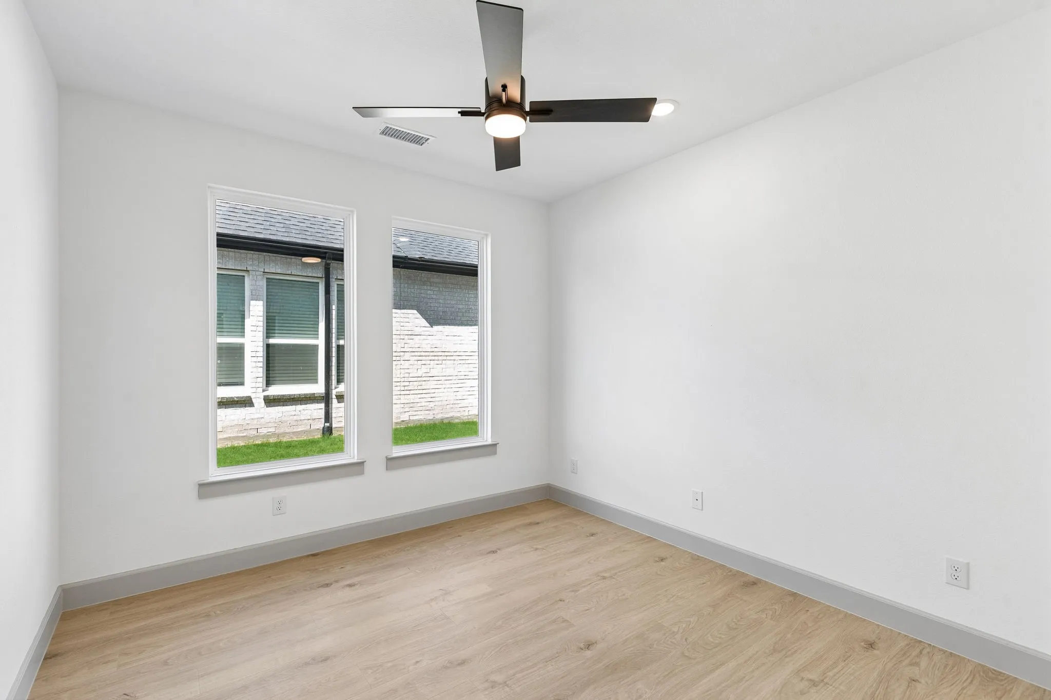 This light filled home office is the perfect place for work or play!
