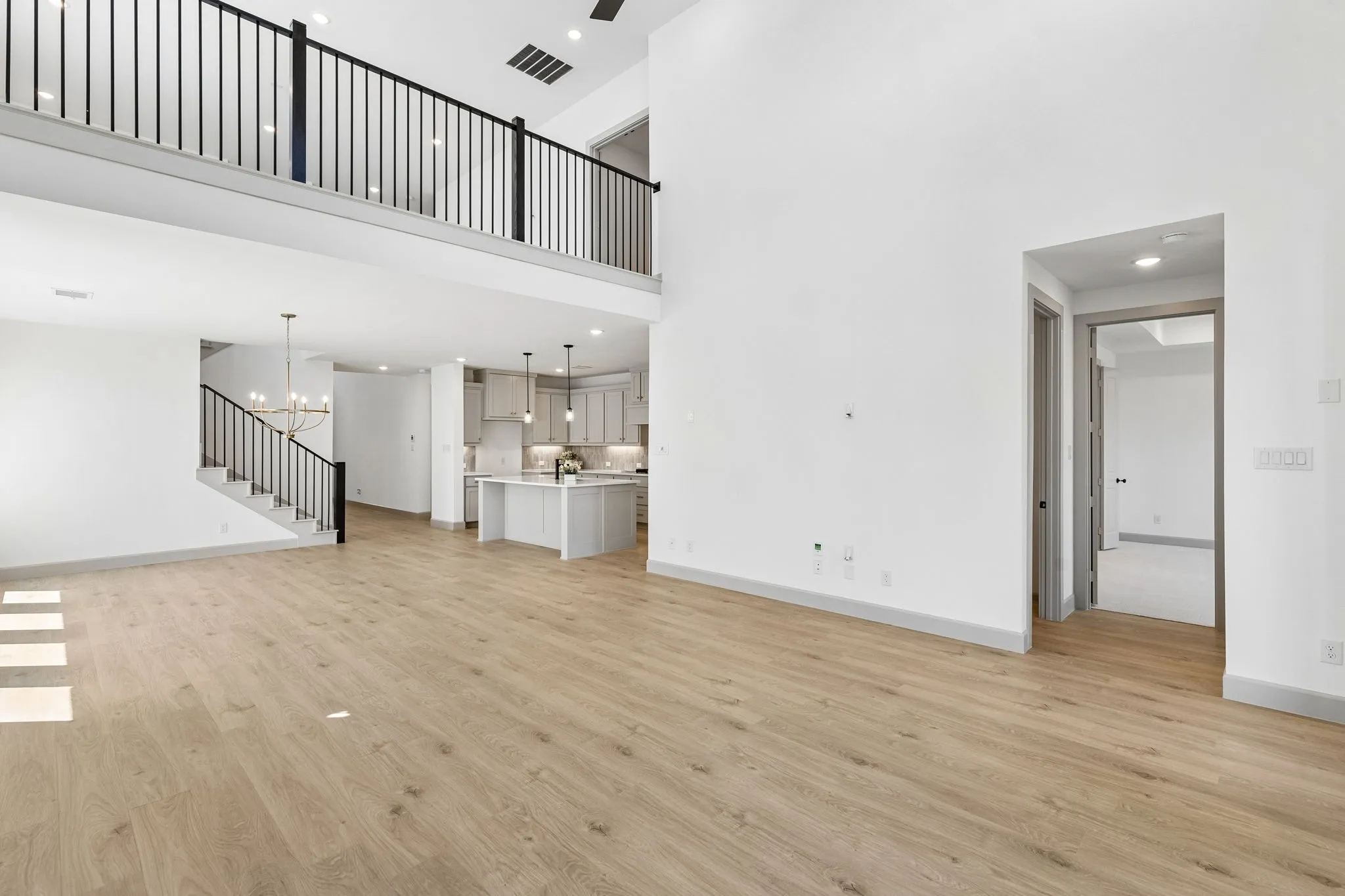 Featuring an open metal railing in the game room that overlooks the family room, you'll enjoy a dual level entertainment zone in this lovely home!