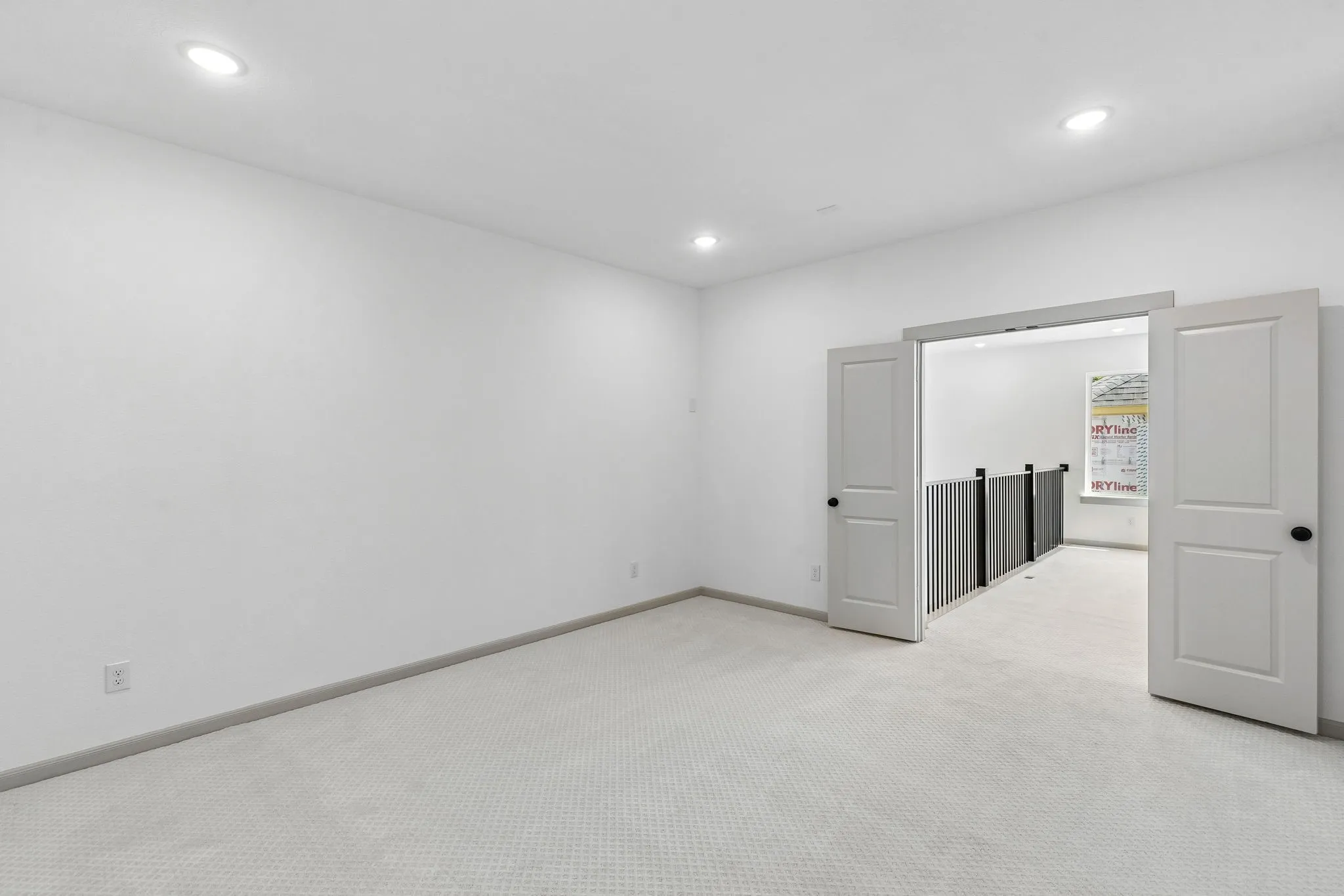 This spacious media room with adjacent game room create the ultimate family entertainment zone!