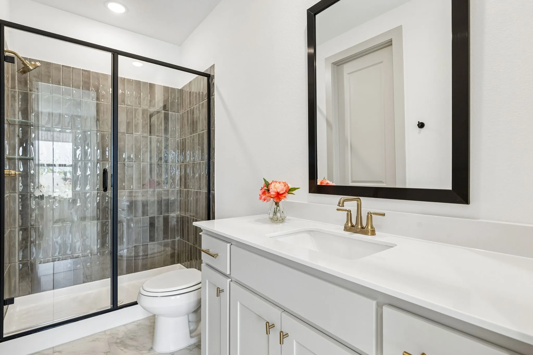 Friends and family will feel right at home in any of the guest baths in this gorgeous home!