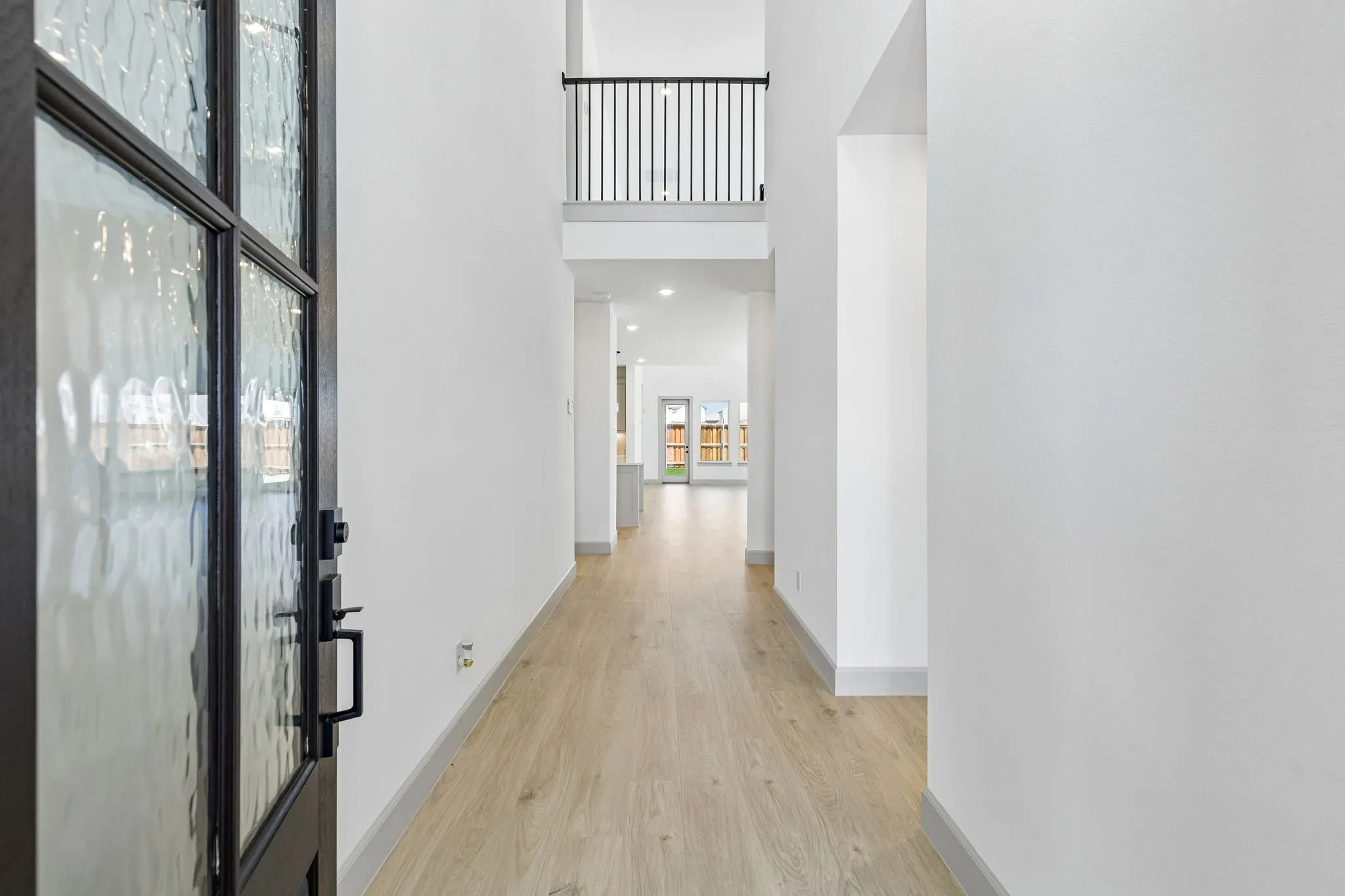 With sight lines from the front through to the rear of the home and ample space to display artwork, this welcome entry is the perfect place to greet family and friends!