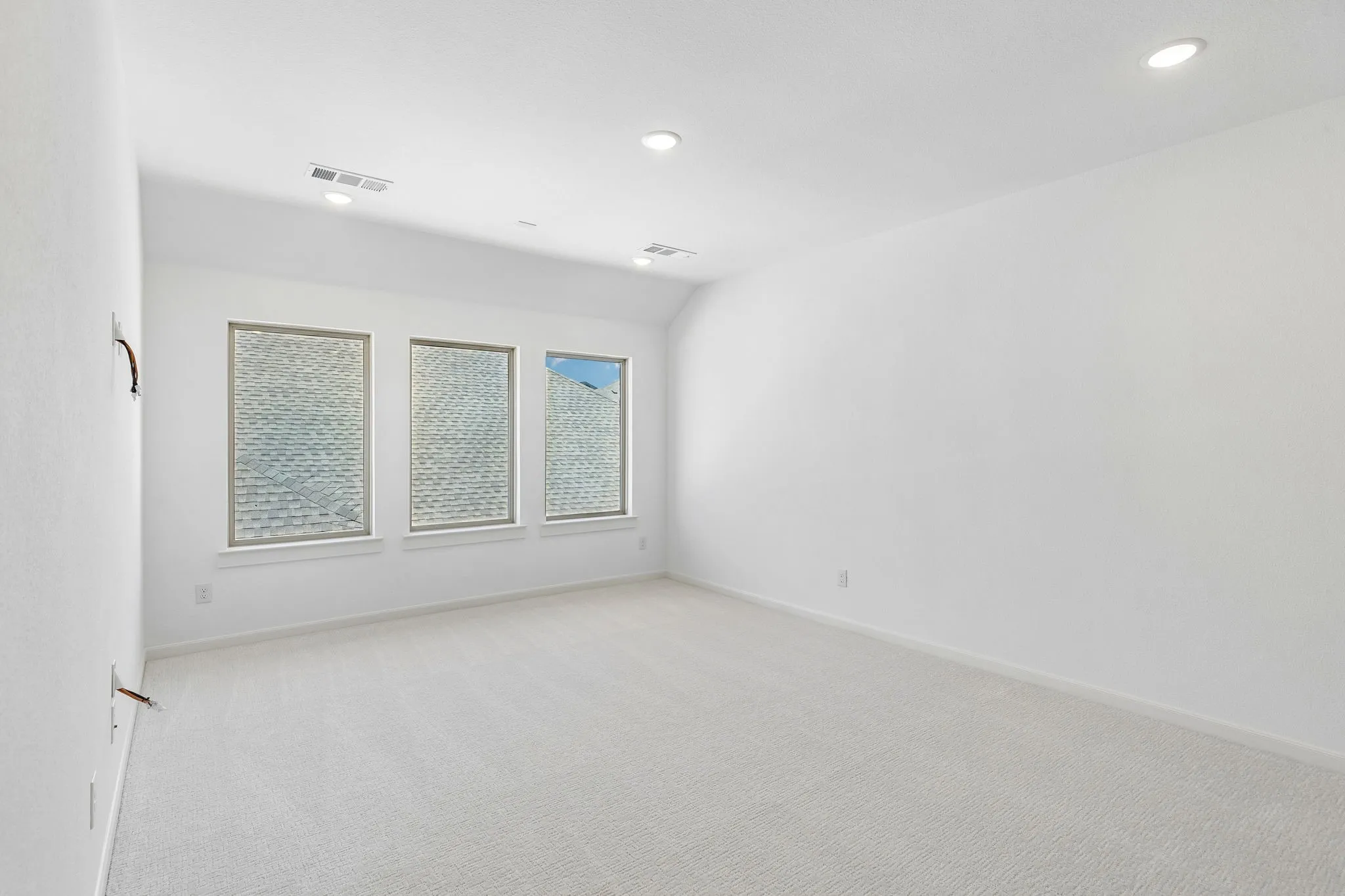 Lots of family fun time is waiting to be had in this spacious, light filled game room!