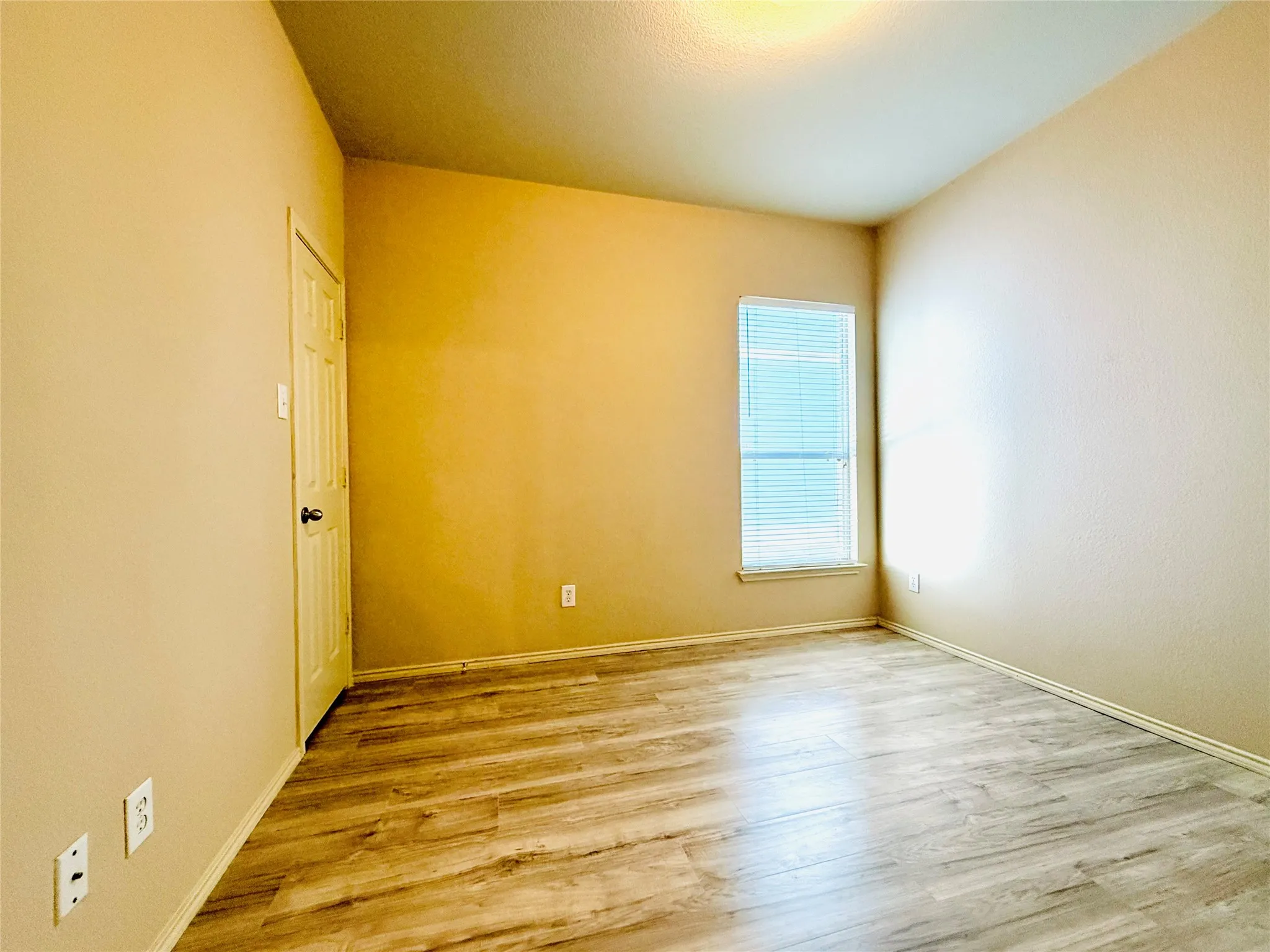 Wood-finish flooring with a neutral wall palette