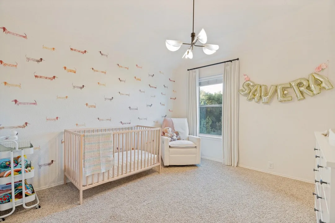 Neutral-toned walls with accent wallpaper