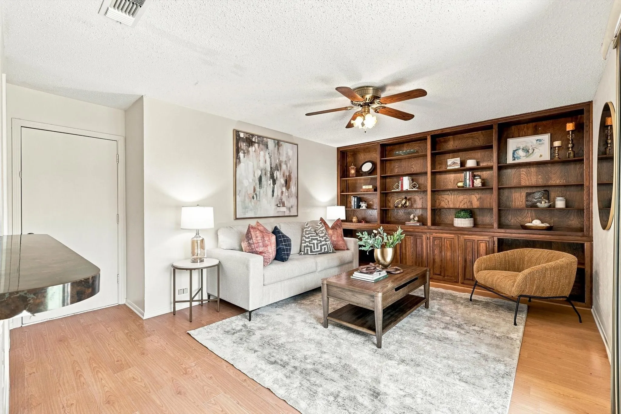 Second living area with built-in bookshelves