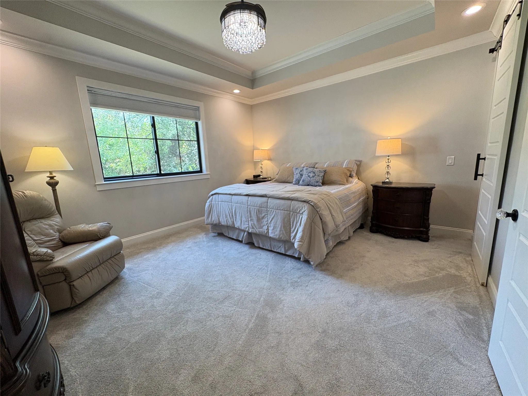 Huge primary bedroom with views to the golf course