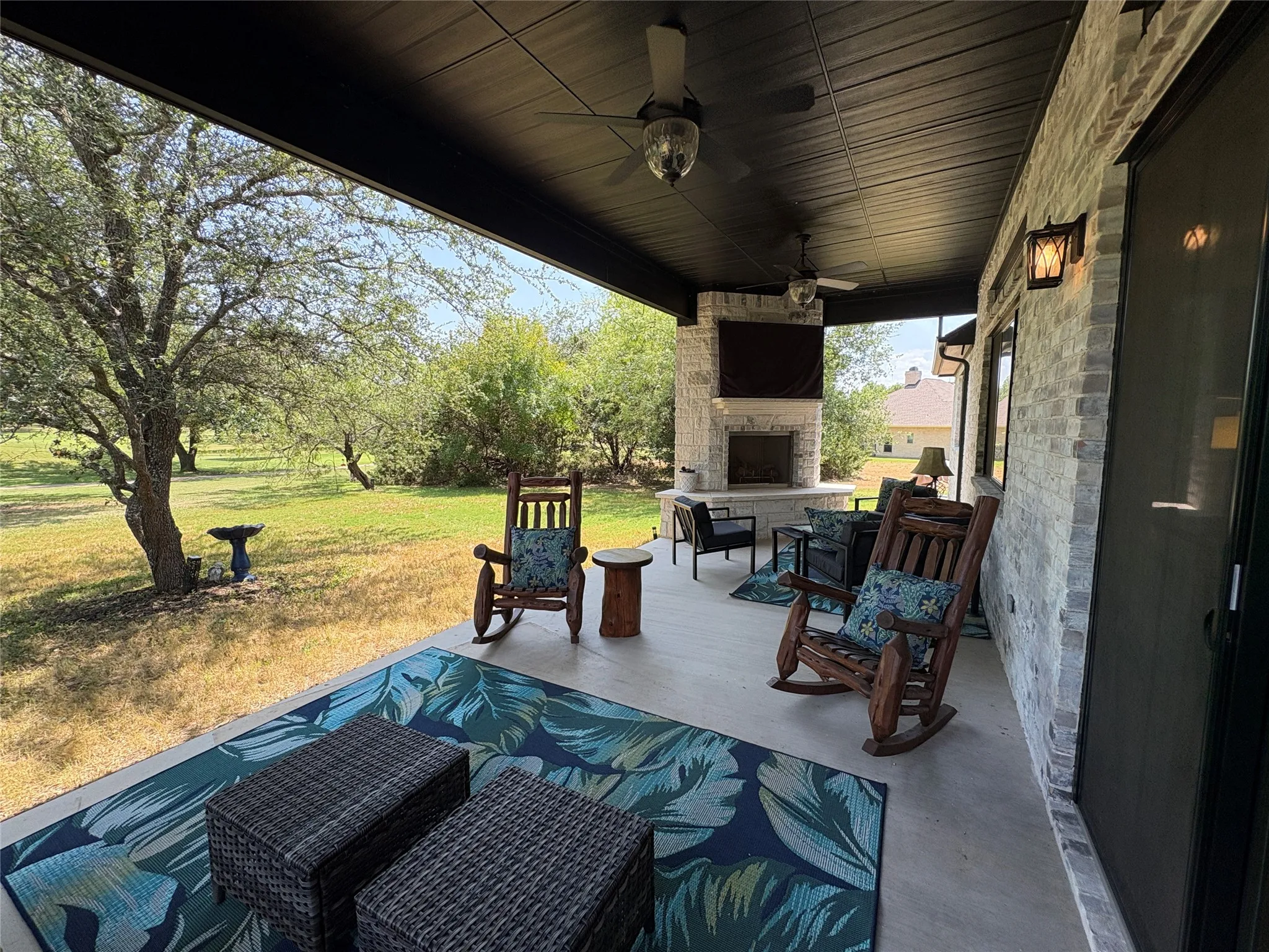 Back patio with TV and gas fireplace