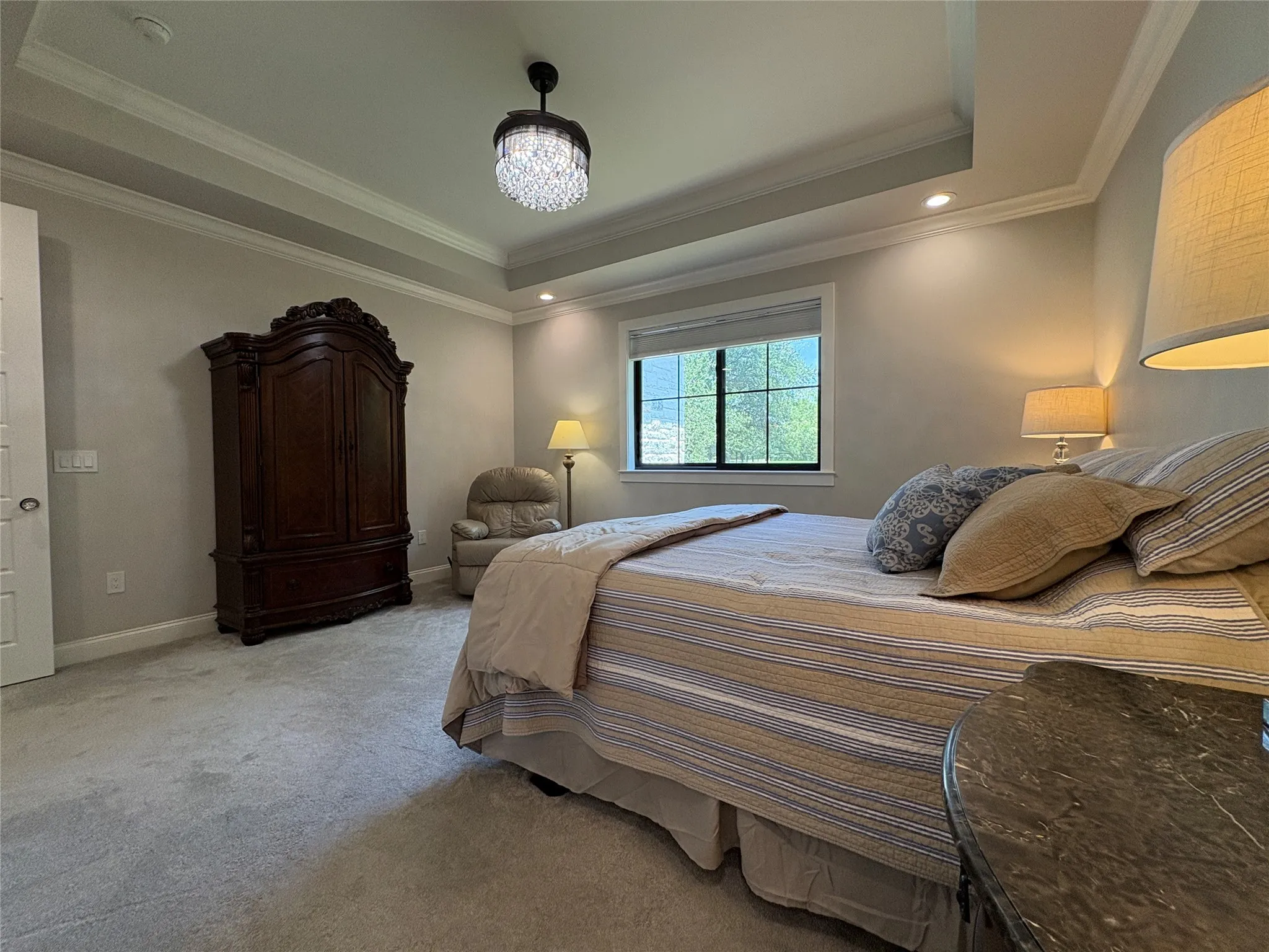 Updated fixtures and a tray ceiling