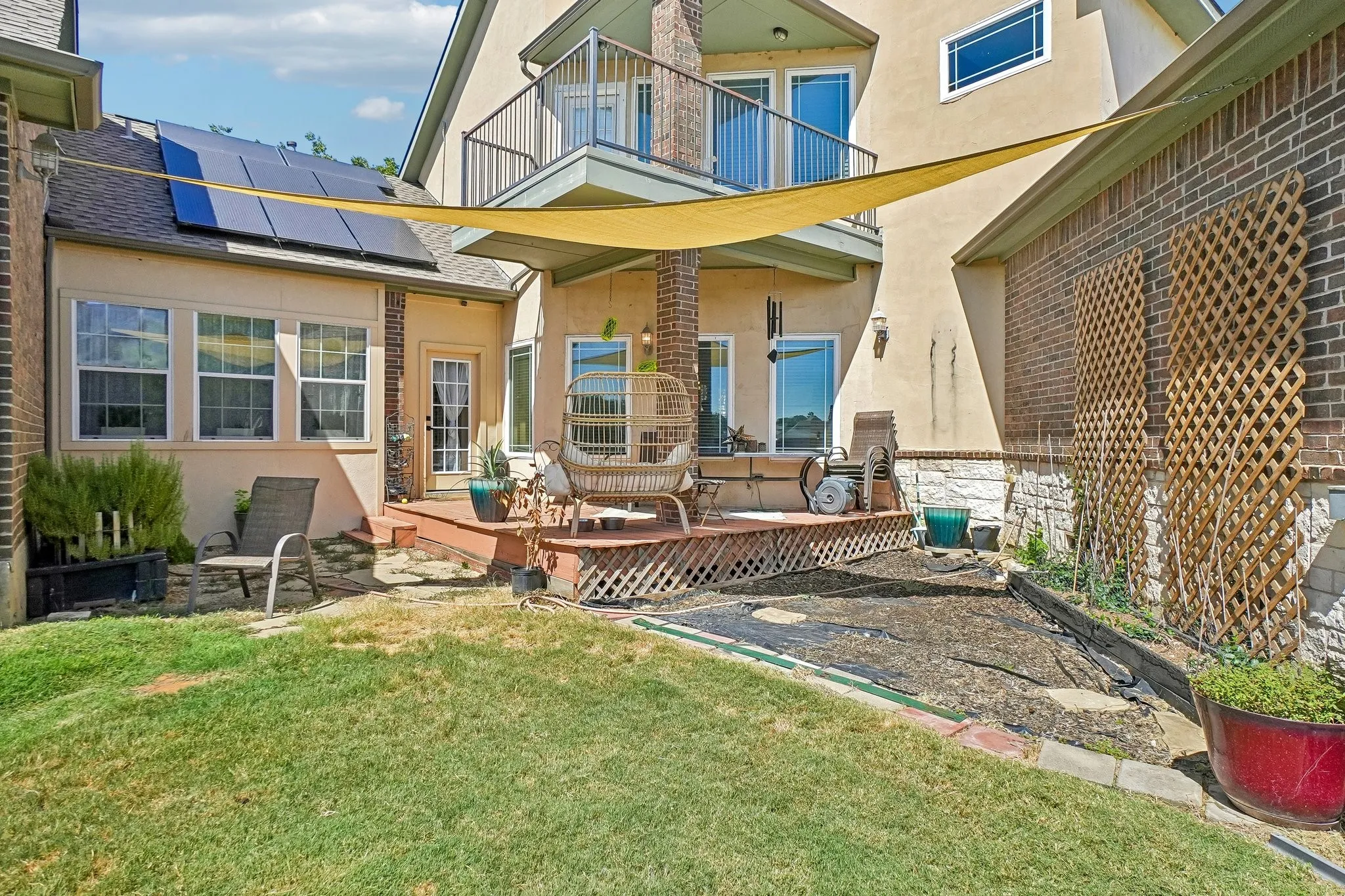 Two out of three backyard decks.   Upper level offers a view of the lake in the distance.