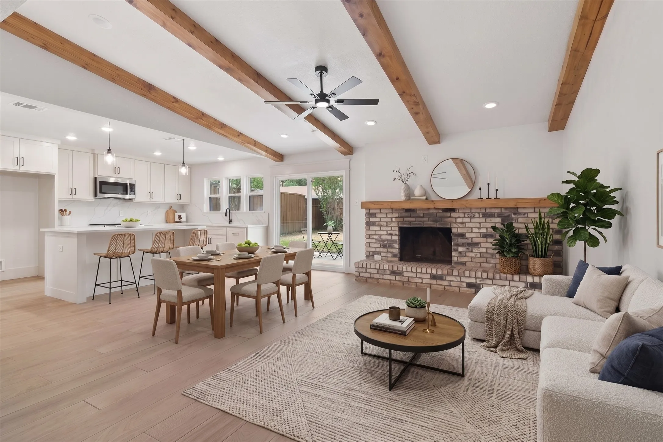 Virtually Staged - vaulted beamed ceiling living, dining and kitchen combo
