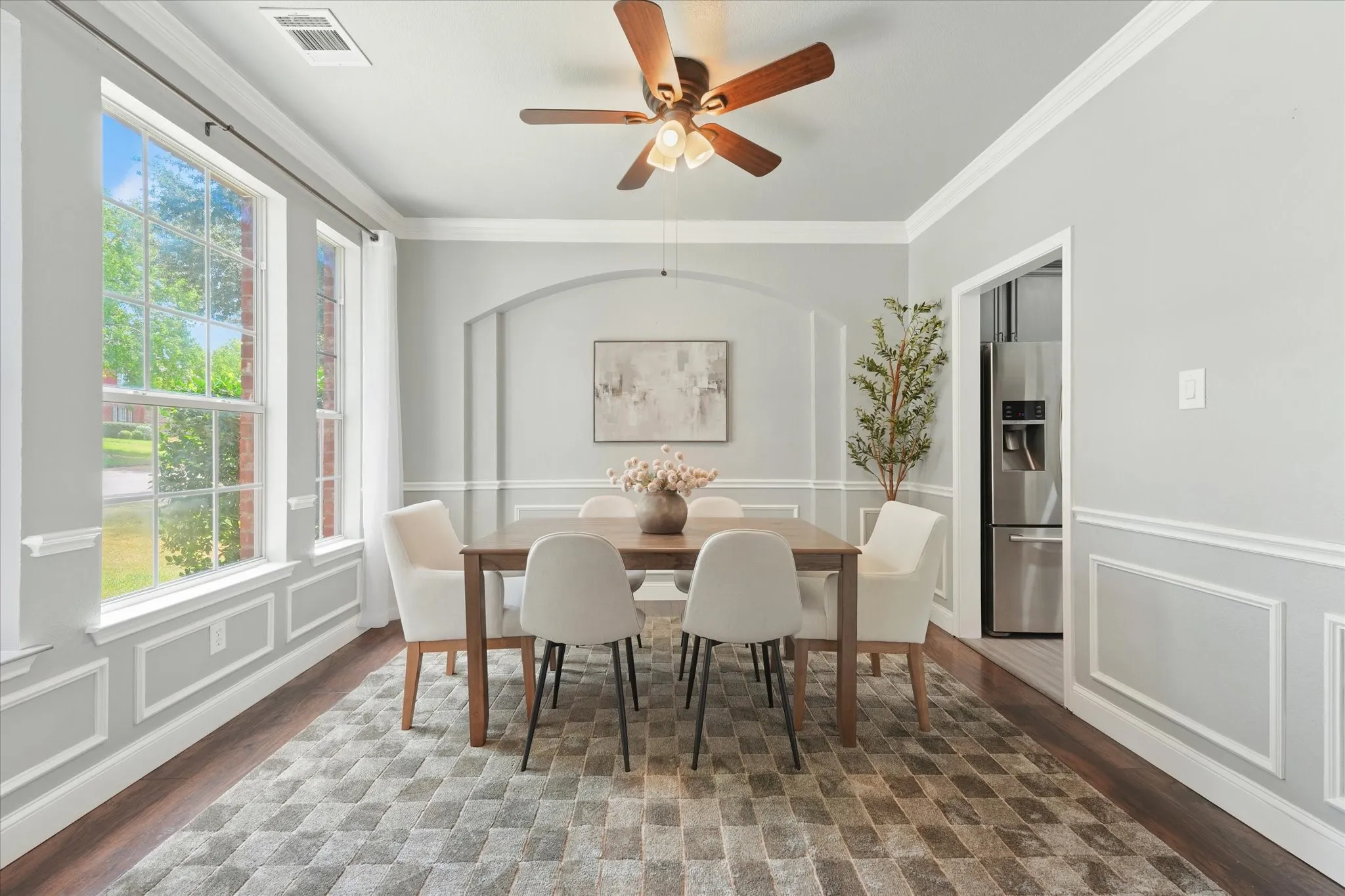 Wood-finish flooring with a patterned area rug