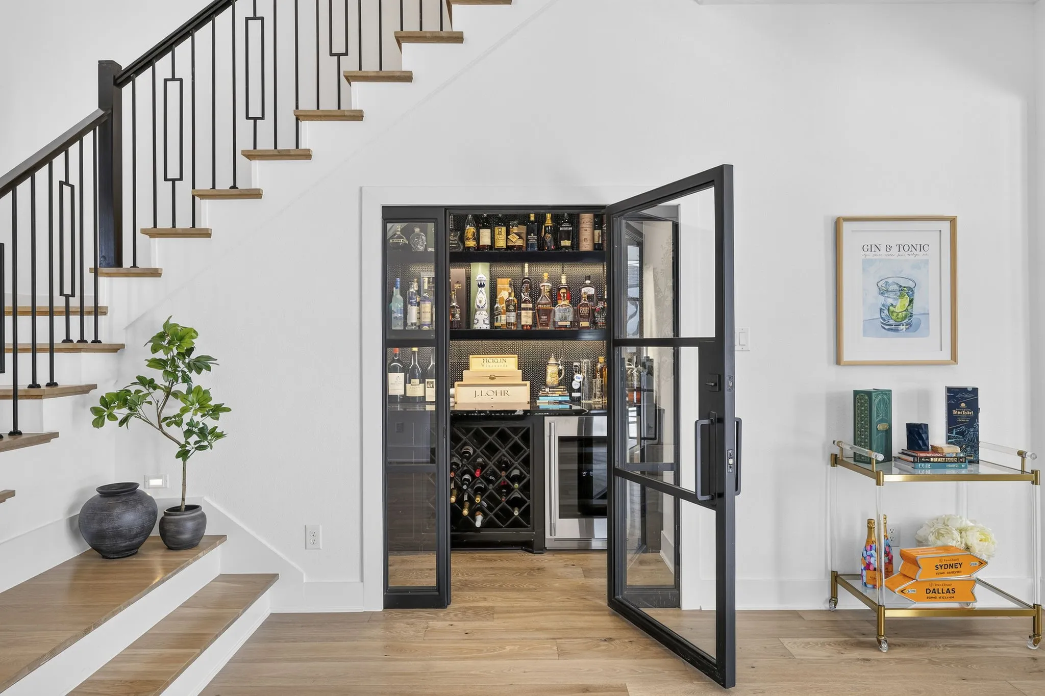 Excellent use of under the stairs storage space! Your own wine room!