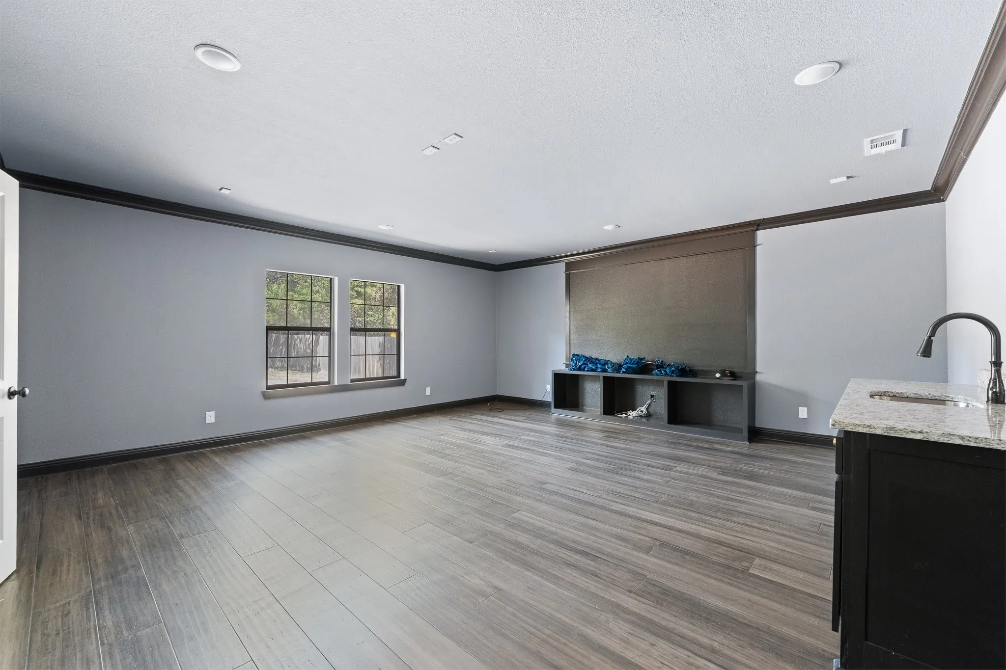 Game room with media screen.