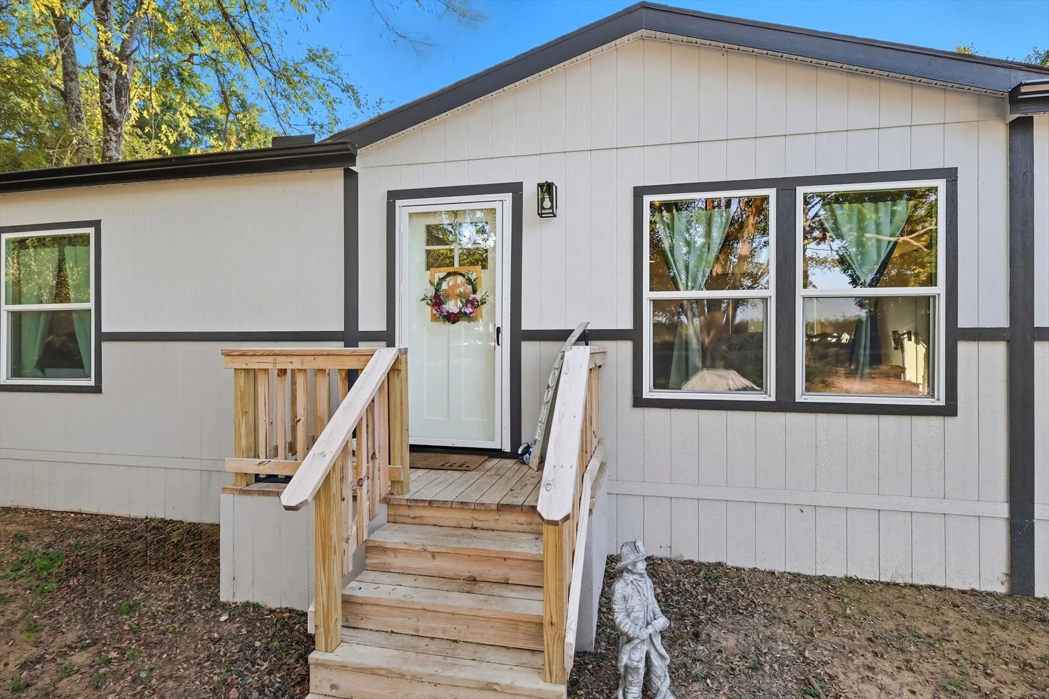 Doorway to property with a deck