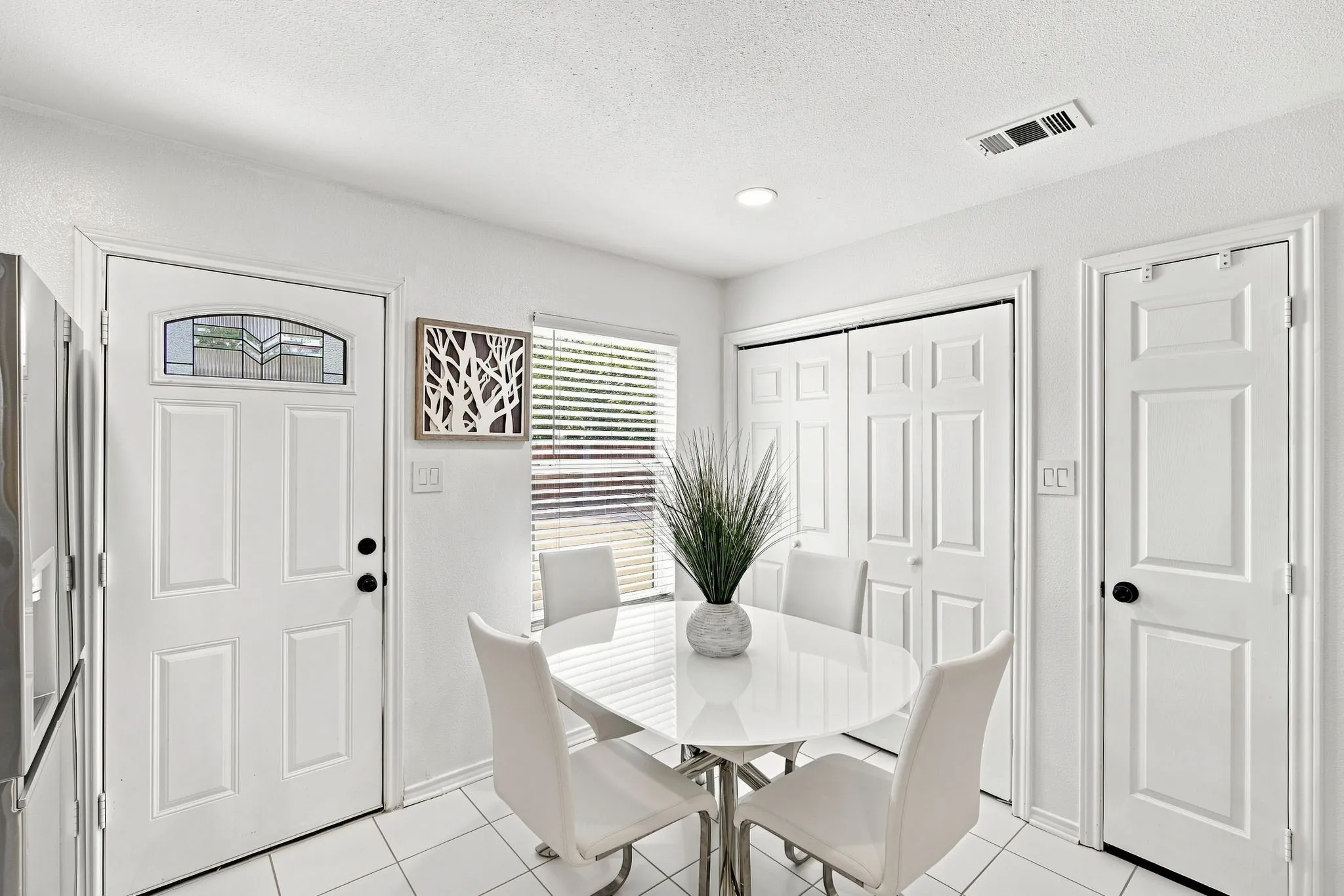 A clean, modern dining space with great natural light — perfect for everyday meals or weekend hosting.