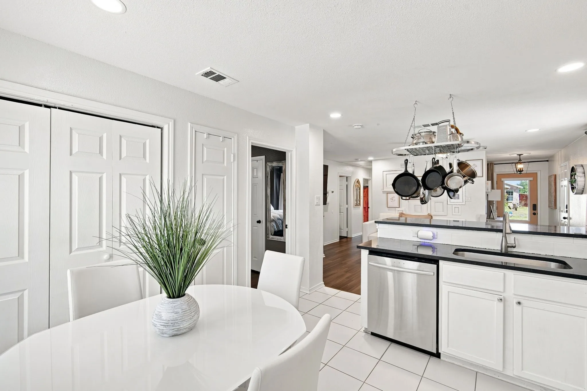 Open-concept layout with tile flooring and seamless transitions. Bright, practical, and ready for real life.